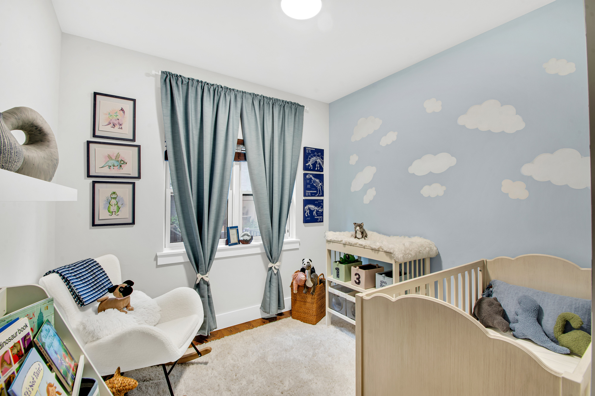 159 West 126th Street, Unit GARDEN A Manhattan, NY 10027 - Photo 8 of 15 a room with furniture and a window