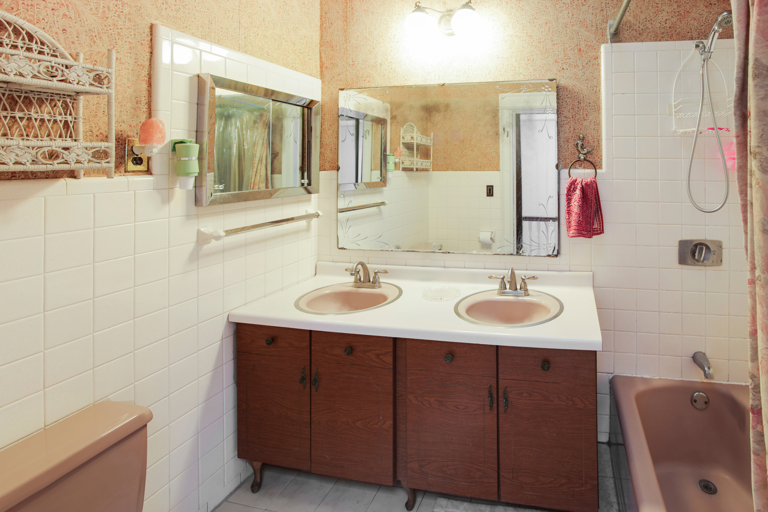 425 81st Street Brooklyn, NY 11209 - Photo 10 of 13 a bathroom with a sink and a mirror