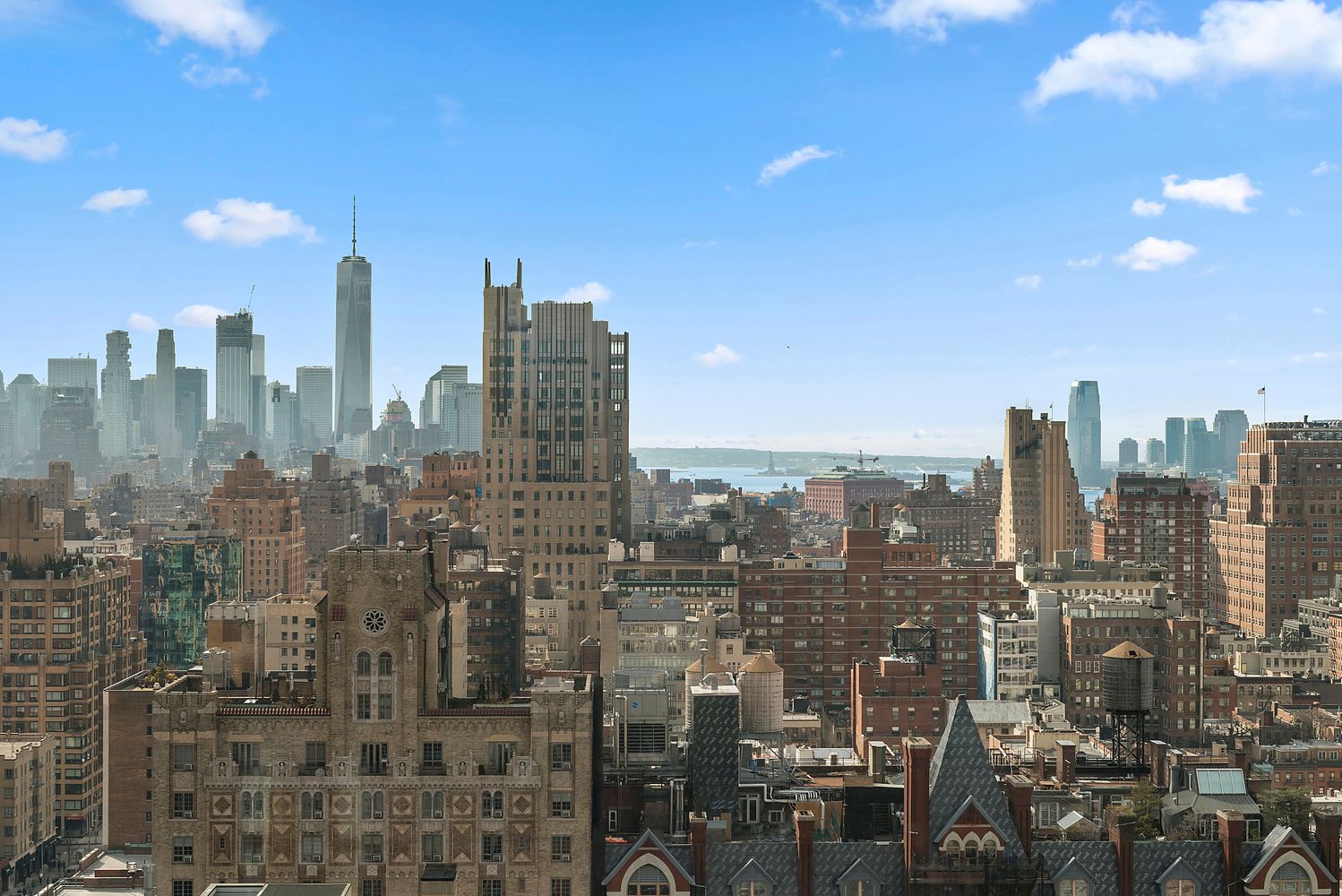 a view of a city with tall buildings