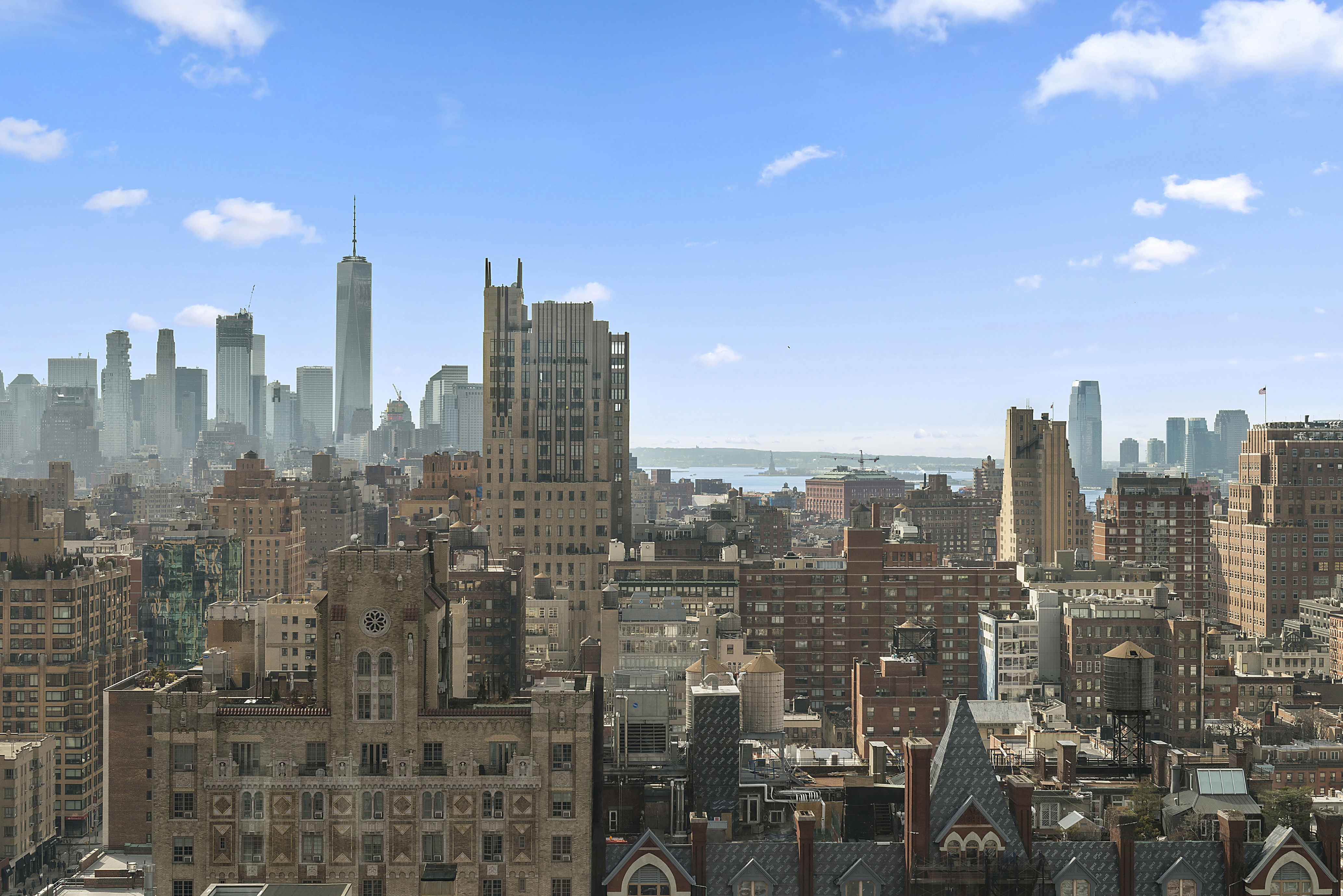 252 7th Avenue, Unit PHD Manhattan, NY 10001 - Photo 4 of 26 a view of a city with tall buildings