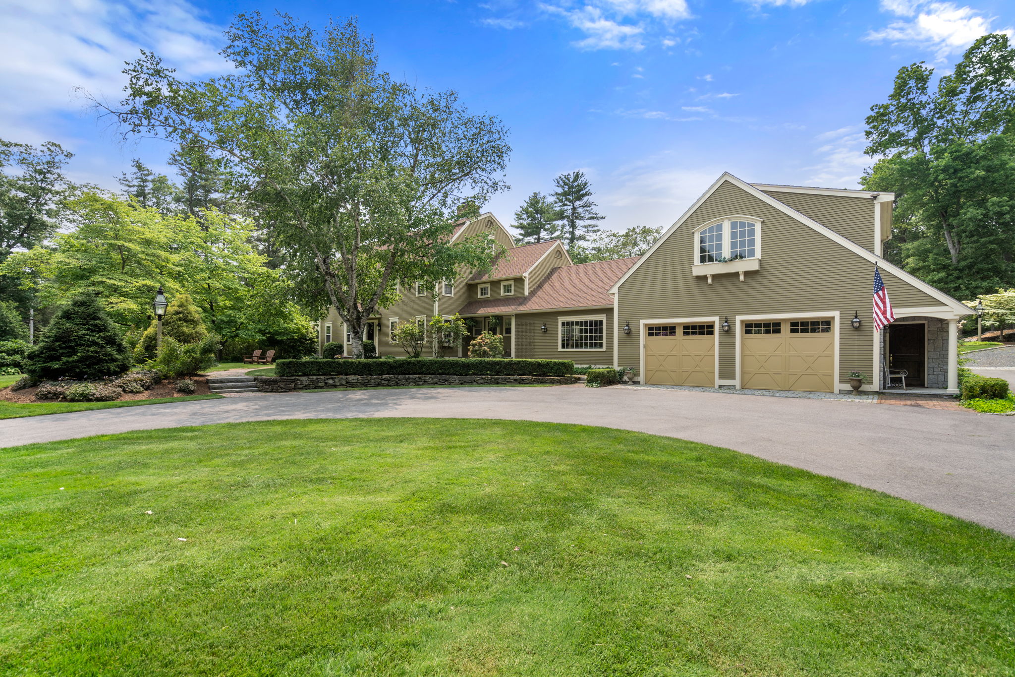 100 Farm Road Sherborn, MA 01770 - Photo 8 of 17 a front view of a house with a garden