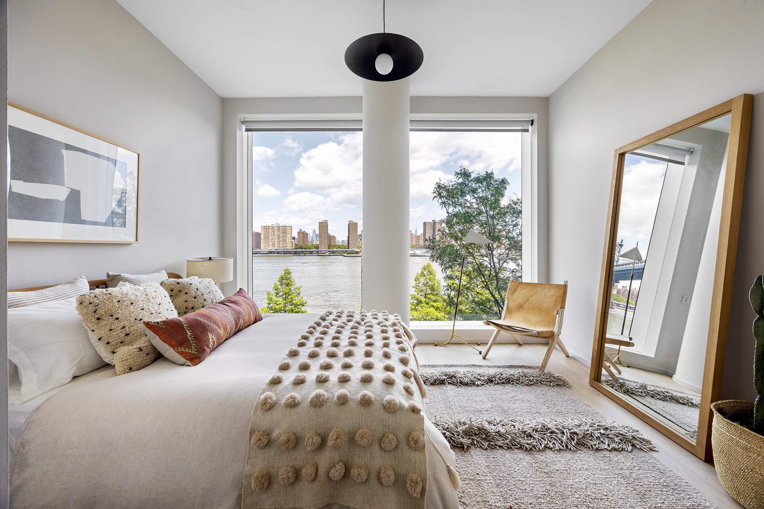 1 John Street, Unit 3B Brooklyn, NY 11201 - Photo 16 of 27 a bedroom with a bed and a large window