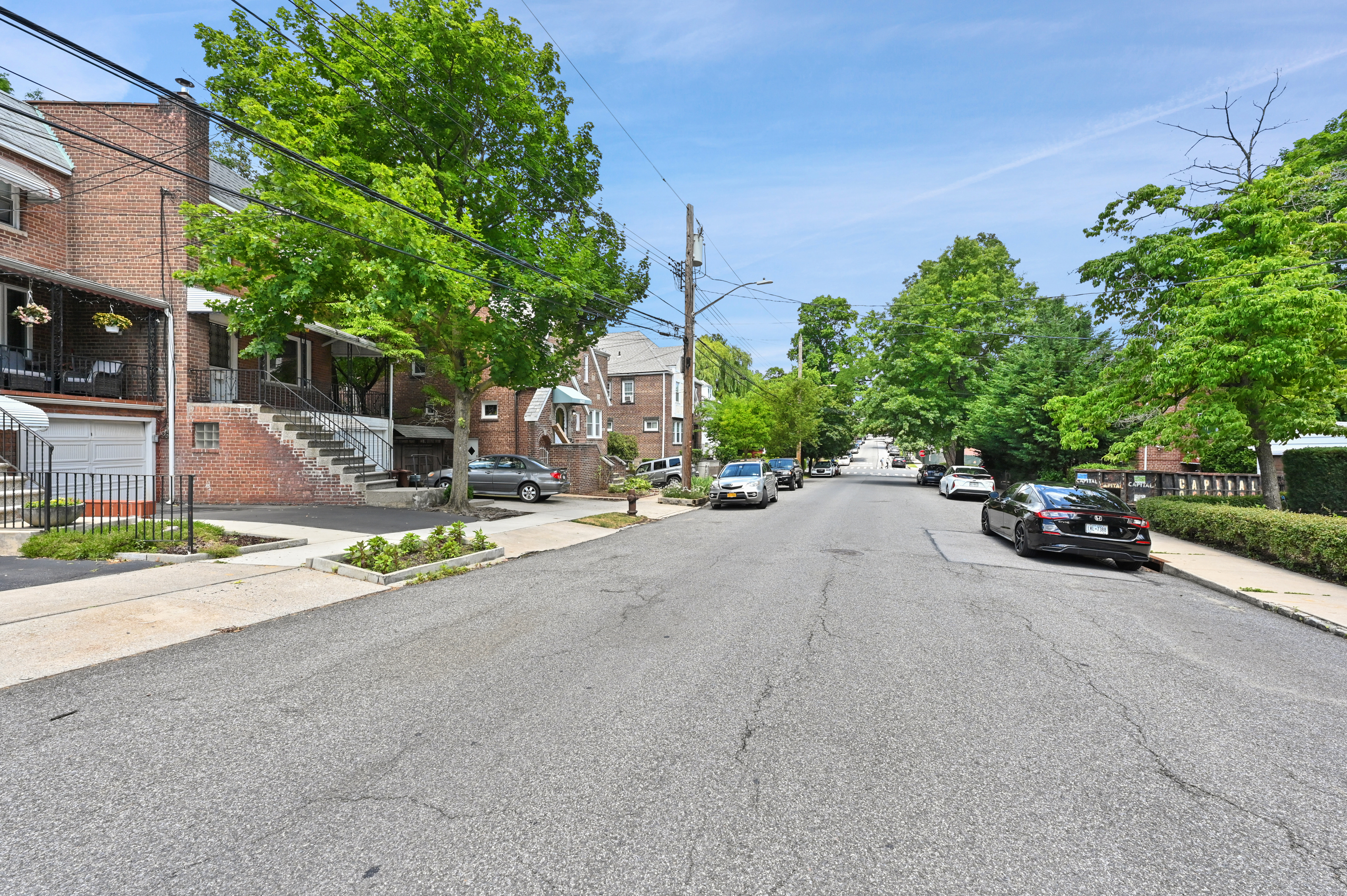 5823 Fieldston Road, Unit 1A Bronx, NY 10471 - Photo 26 of 26 a view of a street with a building and a street view