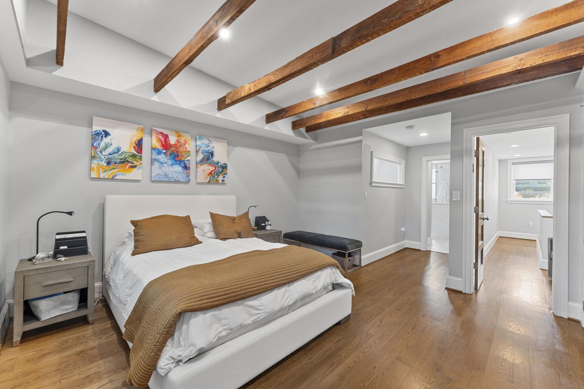 618 3rd Street Northeast Washington, DC 20002 - Photo 5 of 7 a bedroom with a bed and wooden floor