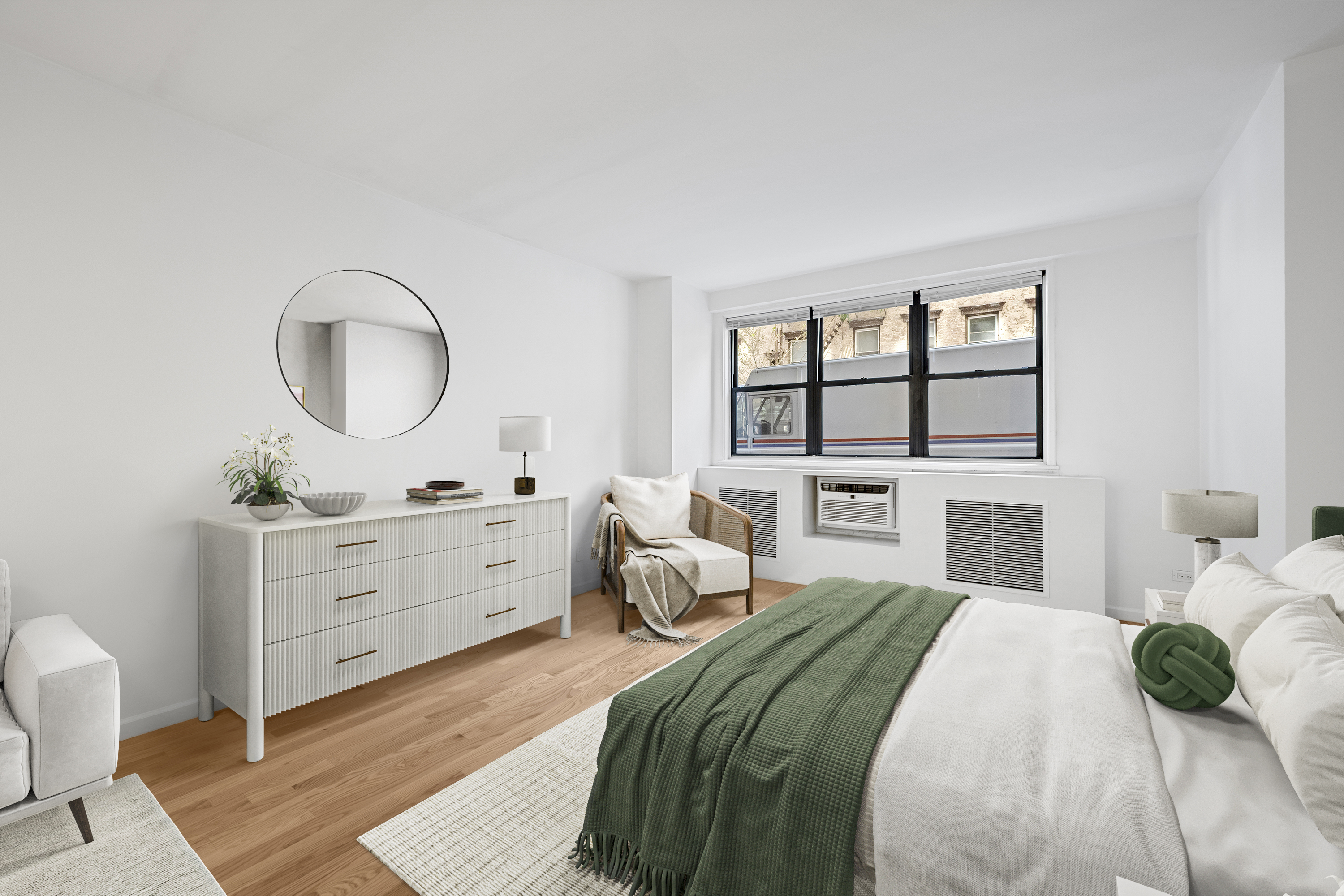 330 3rd Avenue, Unit 1J Manhattan, NY 10010 - Photo 3 of 9 a bedroom with a bed large window and a potted plant