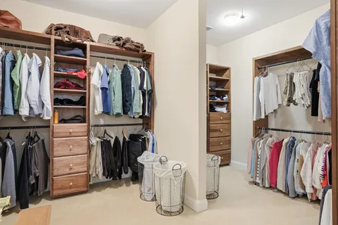 a bathroom with a sink a toilet and shower curtain