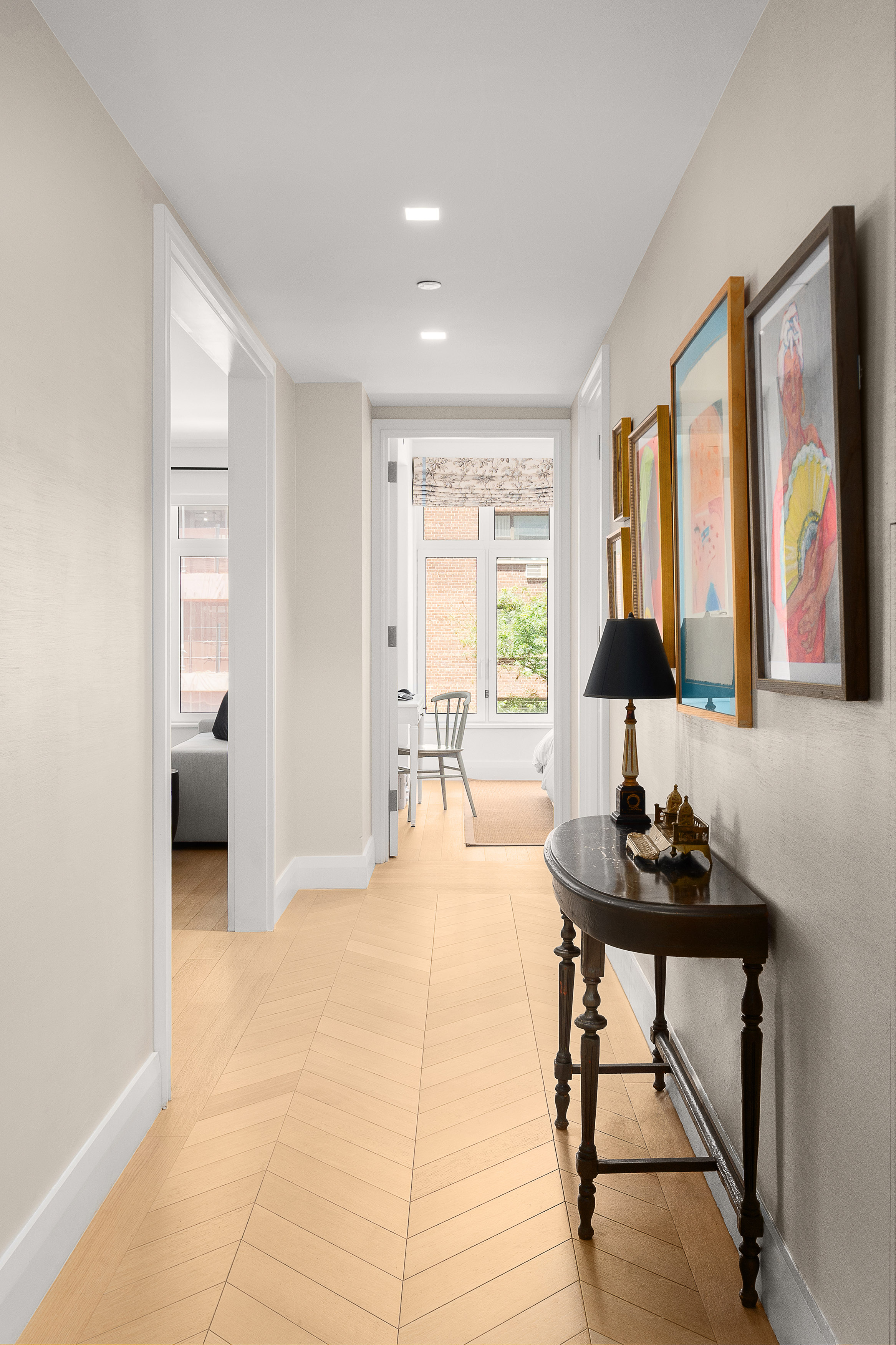 200 East 83rd Street, Unit 4E Manhattan, NY 10028 - Photo 5 of 29 a living room with furniture and a large window