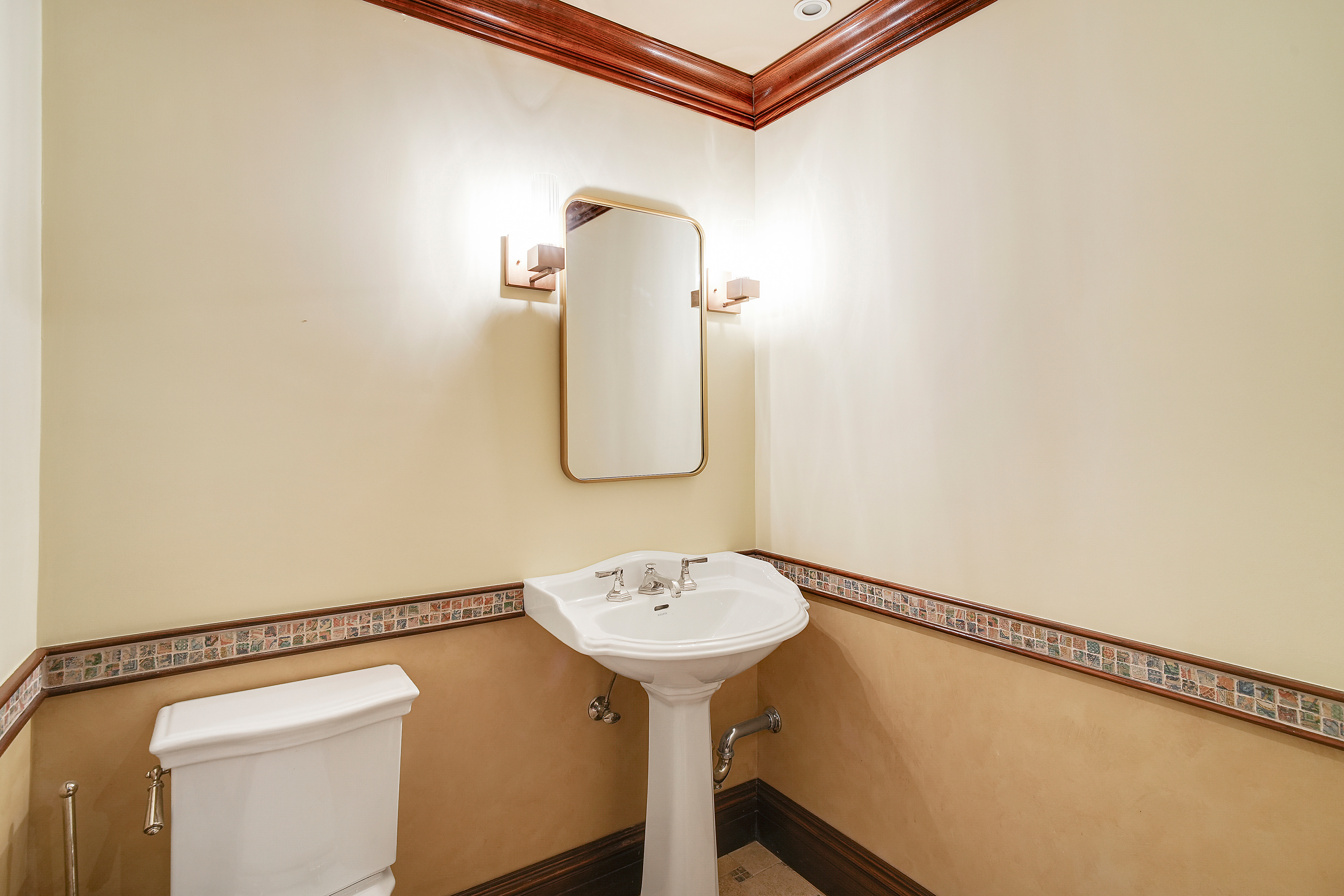 175 East 62nd Street, Unit 8D Manhattan, NY 10065 - Photo 20 of 24 a bathroom with a sink and a mirror