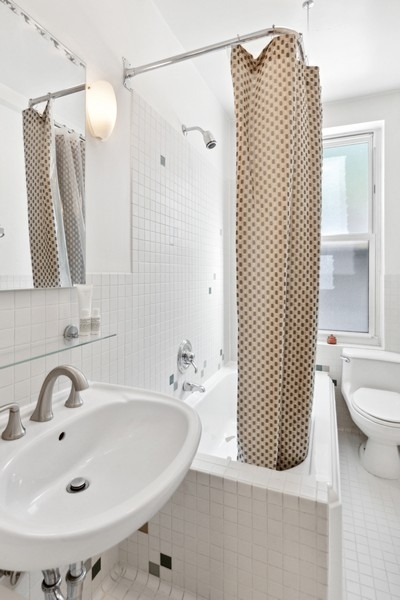 200 West 108th Street, Unit 2A Manhattan, NY 10025 - Photo 7 of 13 a bathroom with a sink and mirror