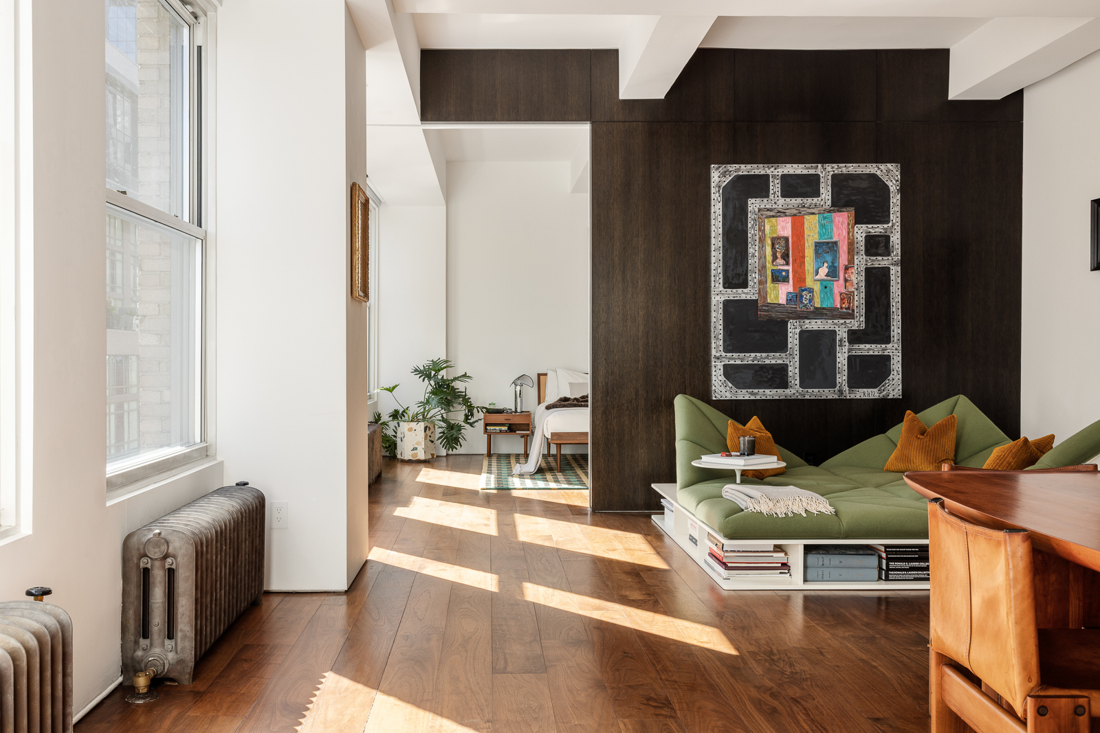 425 Park Avenue South, Unit 14CD Manhattan, NY 10016 - Photo 3 of 17 a living room with furniture wooden floor and a large window