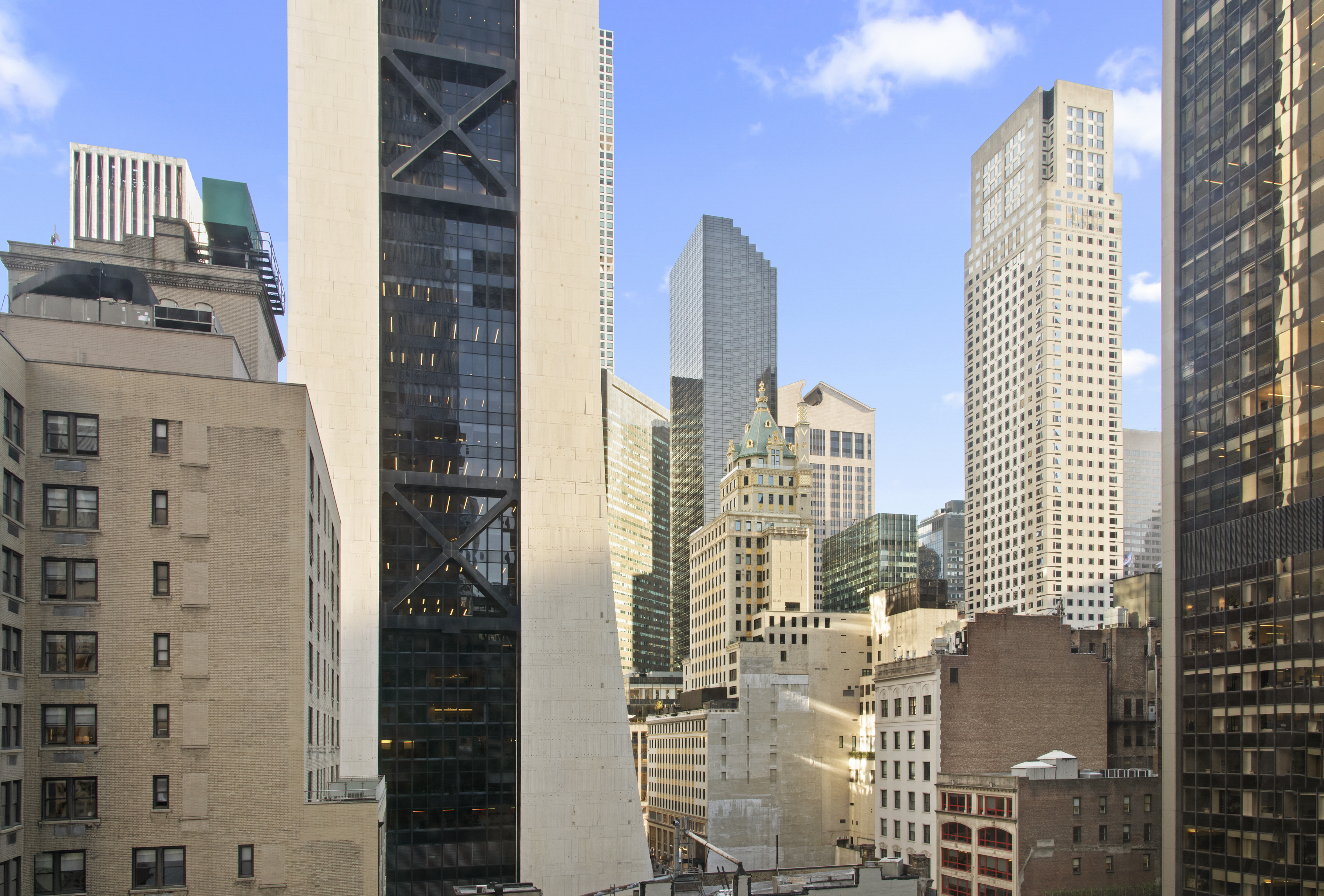 58 West 58th Street, Unit 10D Manhattan, NY 10019 - Photo 5 of 10 a city view with tall buildings