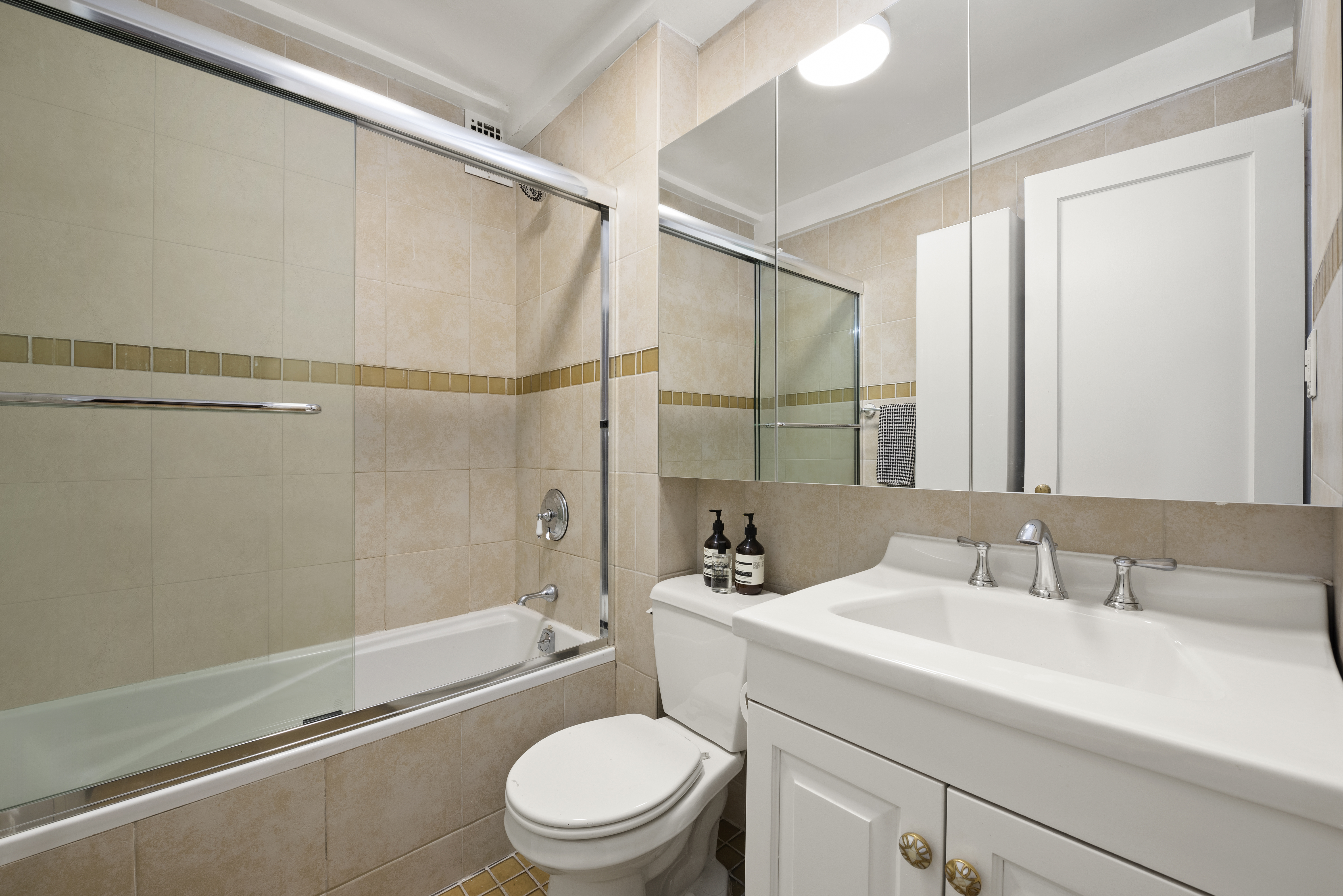 7 Park Avenue, Unit 2H Manhattan, NY 10016 - Photo 5 of 11 a bathroom with a sink toilet and shower