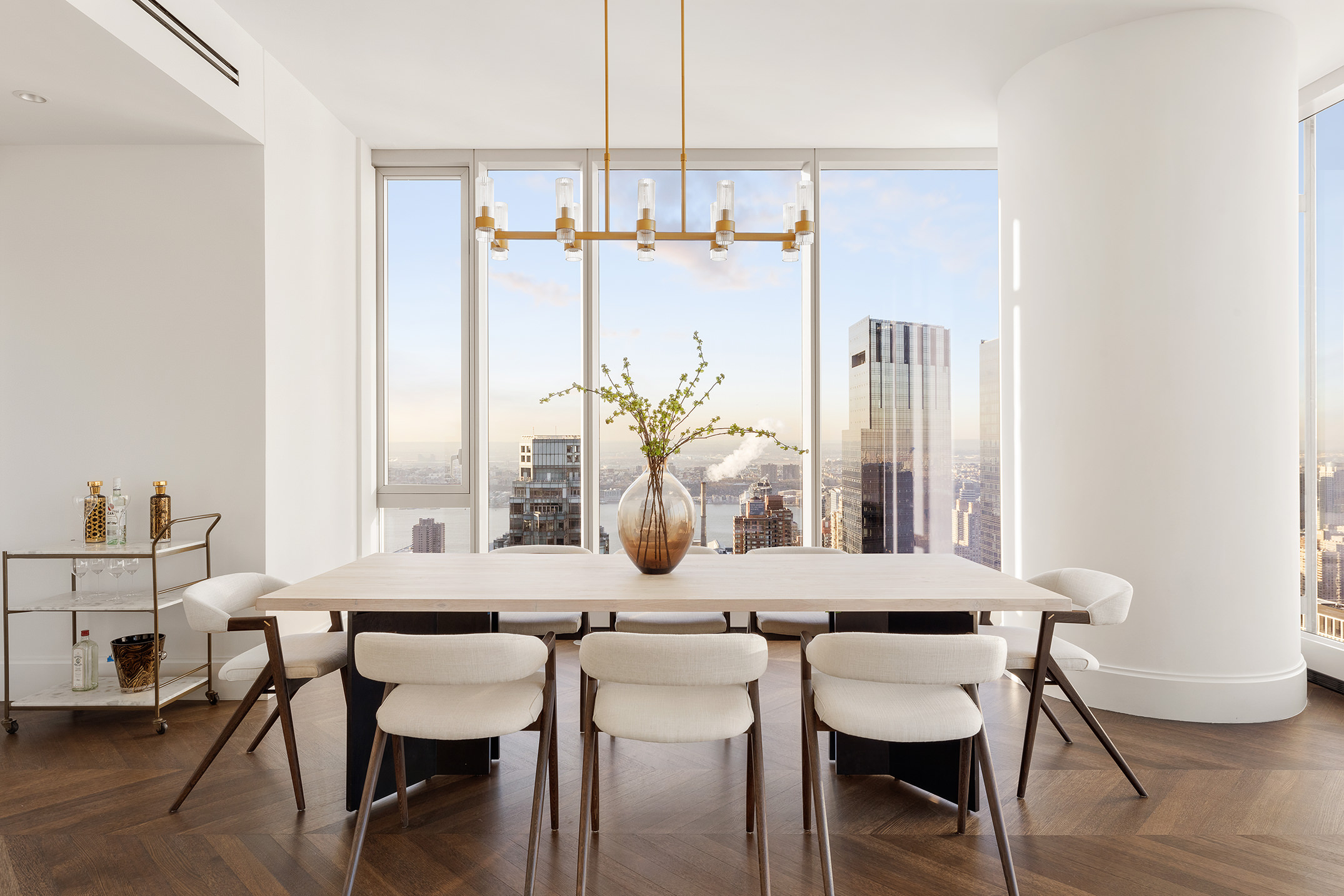 217 West 57th Street, Unit 60W Manhattan, NY 10019 - Photo 3 of 27 a view of a dining room with furniture and window