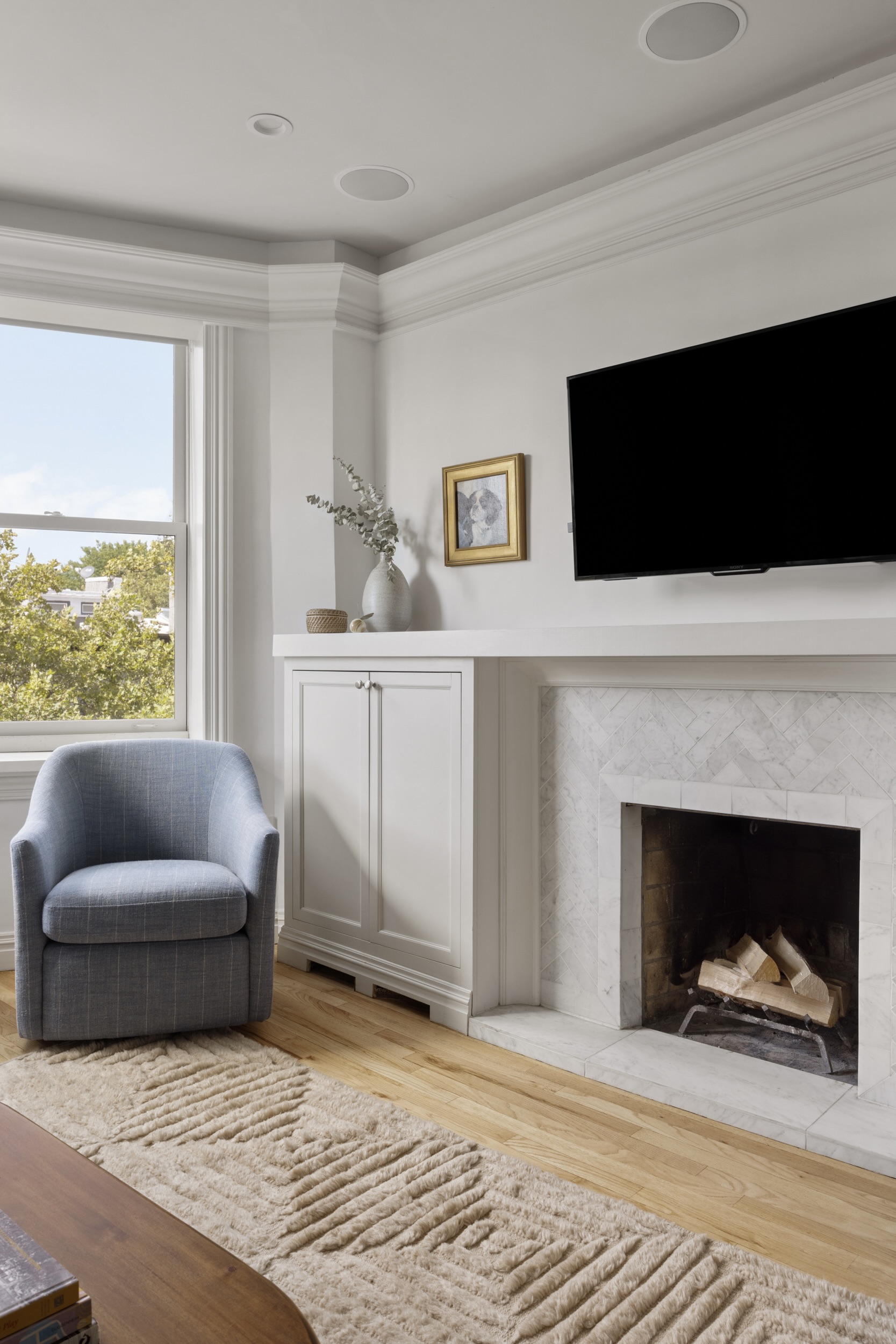 209 Clinton Street, Unit 4L Brooklyn, NY 11201 - Photo 3 of 17 a living room with furniture and a fireplace