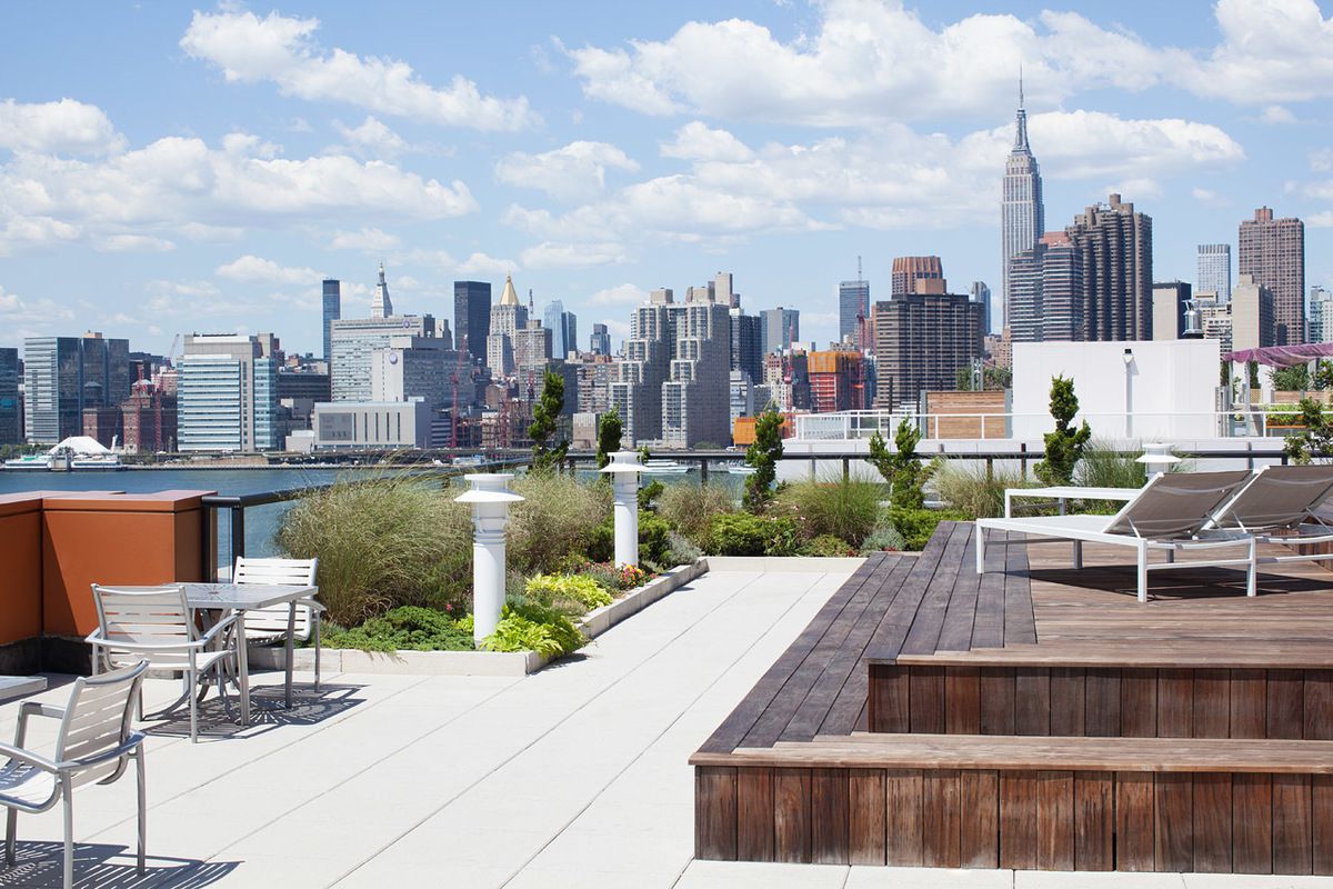 2-17 51st Avenue, Unit 606 Queens, NY 11101 - Photo 12 of 18 a view of a city with tall buildings