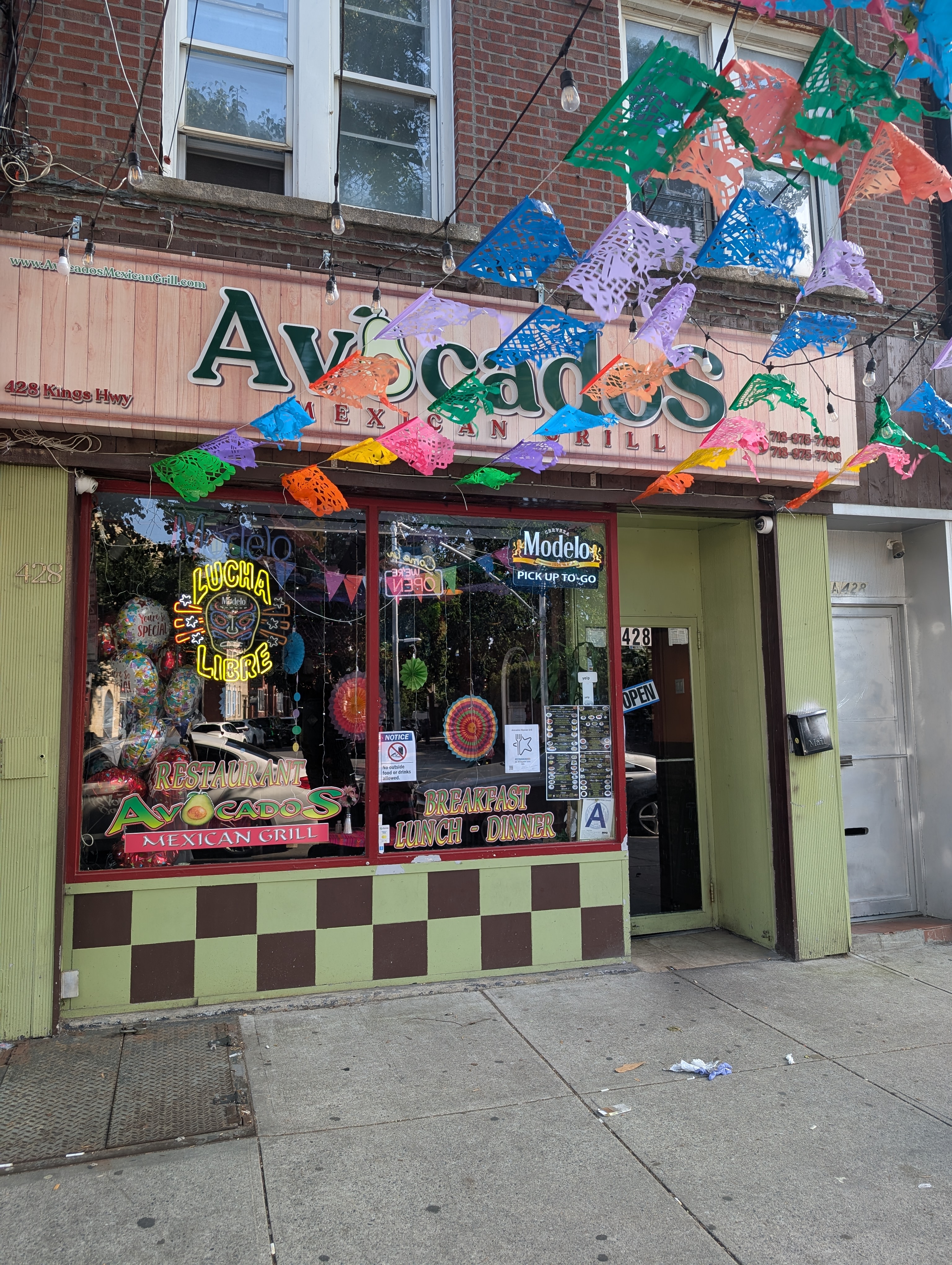 1759 West 1st Street Brooklyn, NY 11223 - Photo 21 of 21 a view of people sitting in front of store