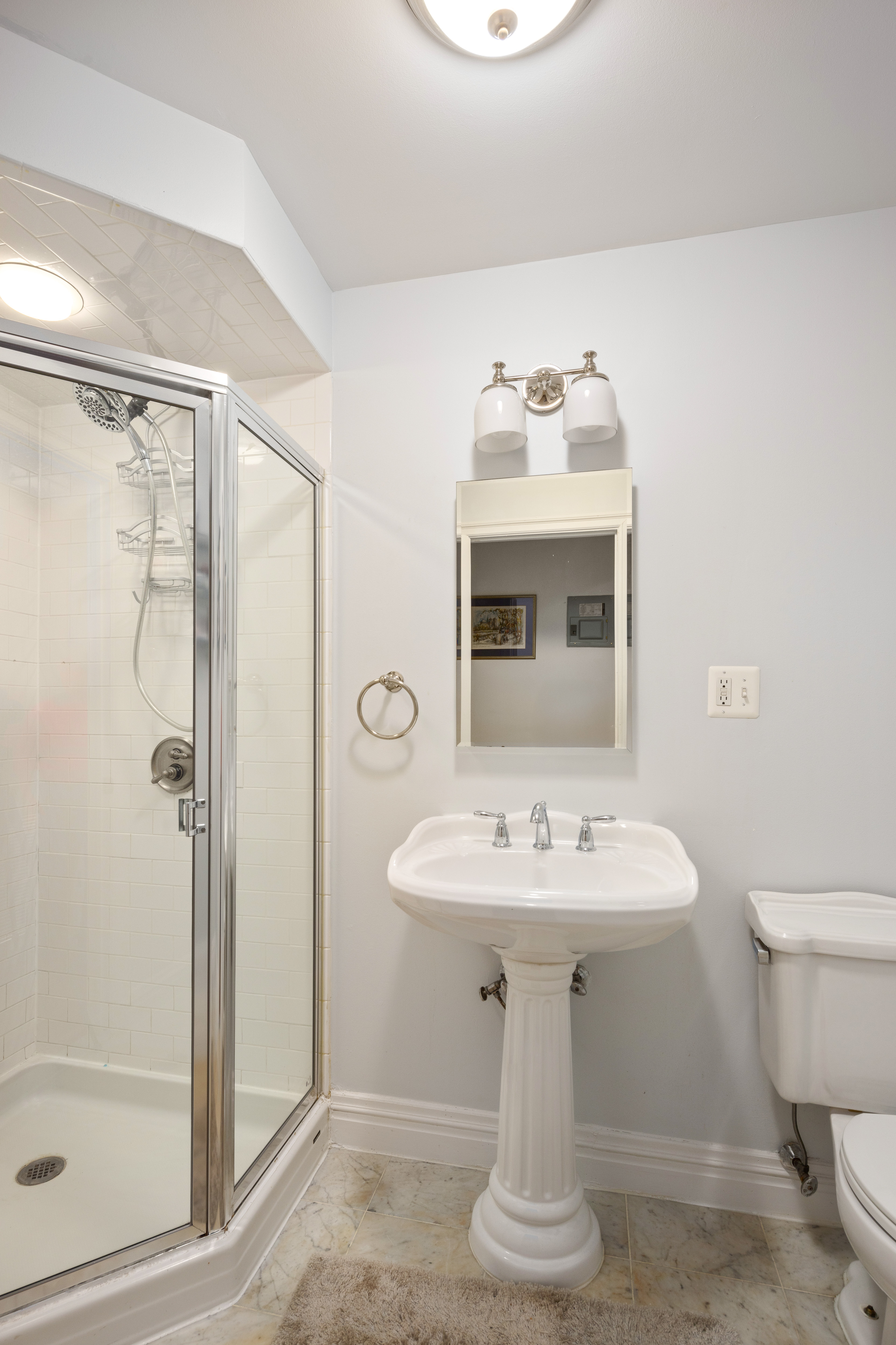 303 Warren Street, Unit 2 Brooklyn, NY 11201 - Photo 8 of 10 a bathroom with a sink toilet and shower