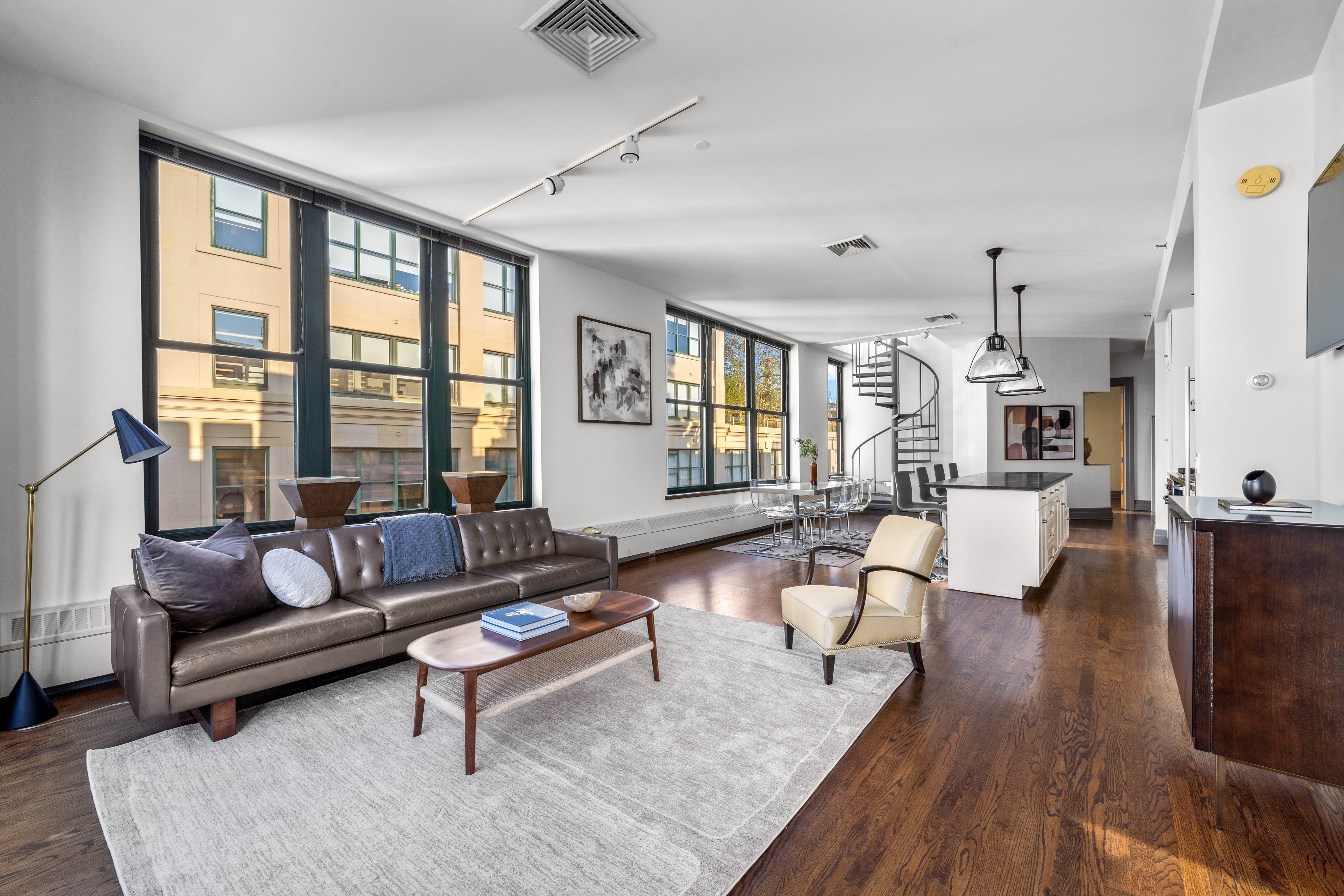 30 Main Street, Unit PHB Brooklyn, NY 11201 - Photo 4 of 33 a living room with furniture and a large window