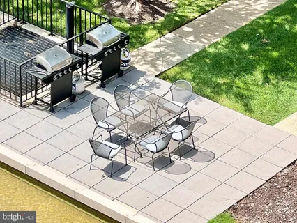 a view of a balcony with wooden floor
