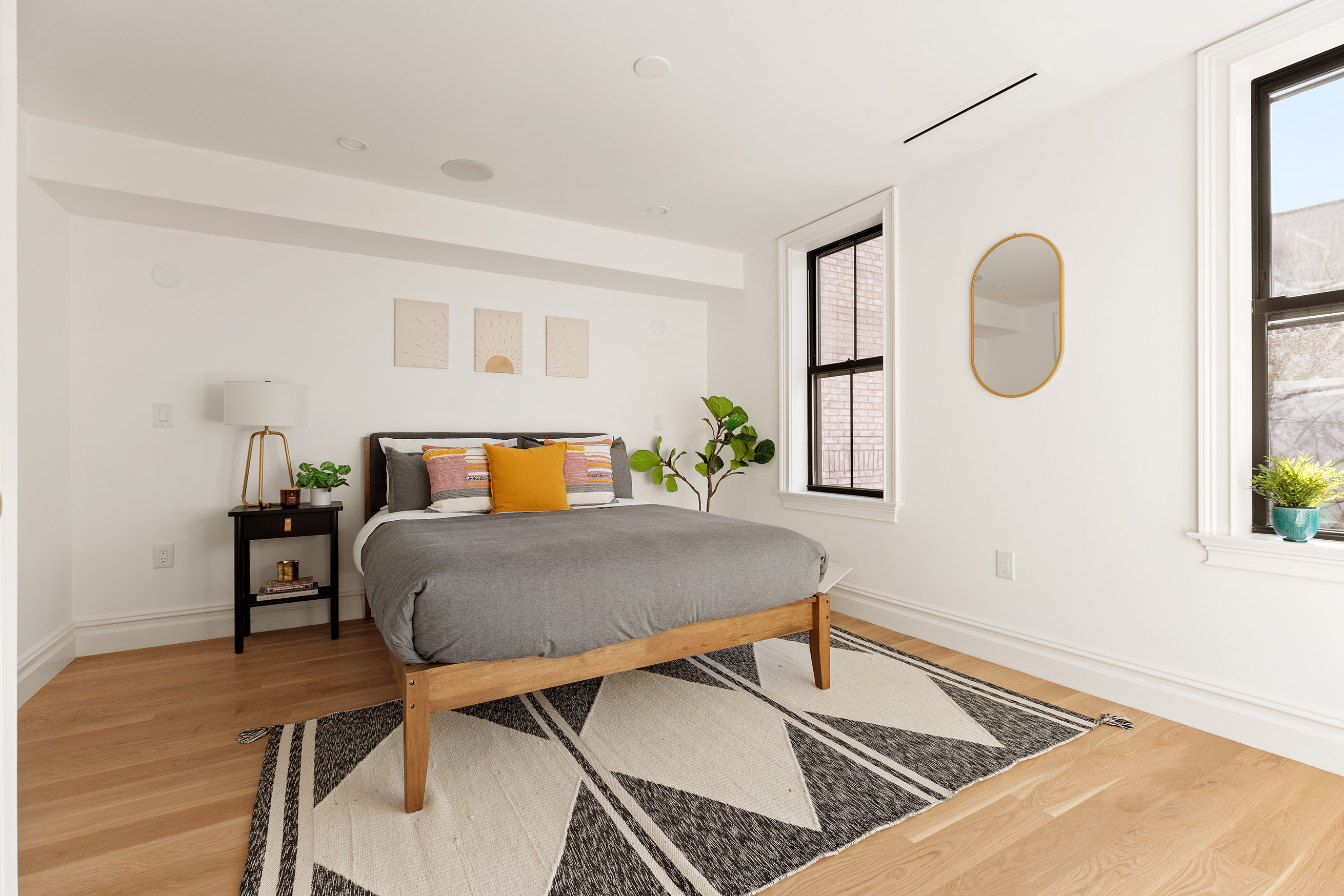 90 Putnam Avenue Brooklyn, NY 11238 - Photo 9 of 15 a living room with a bed furniture and a window