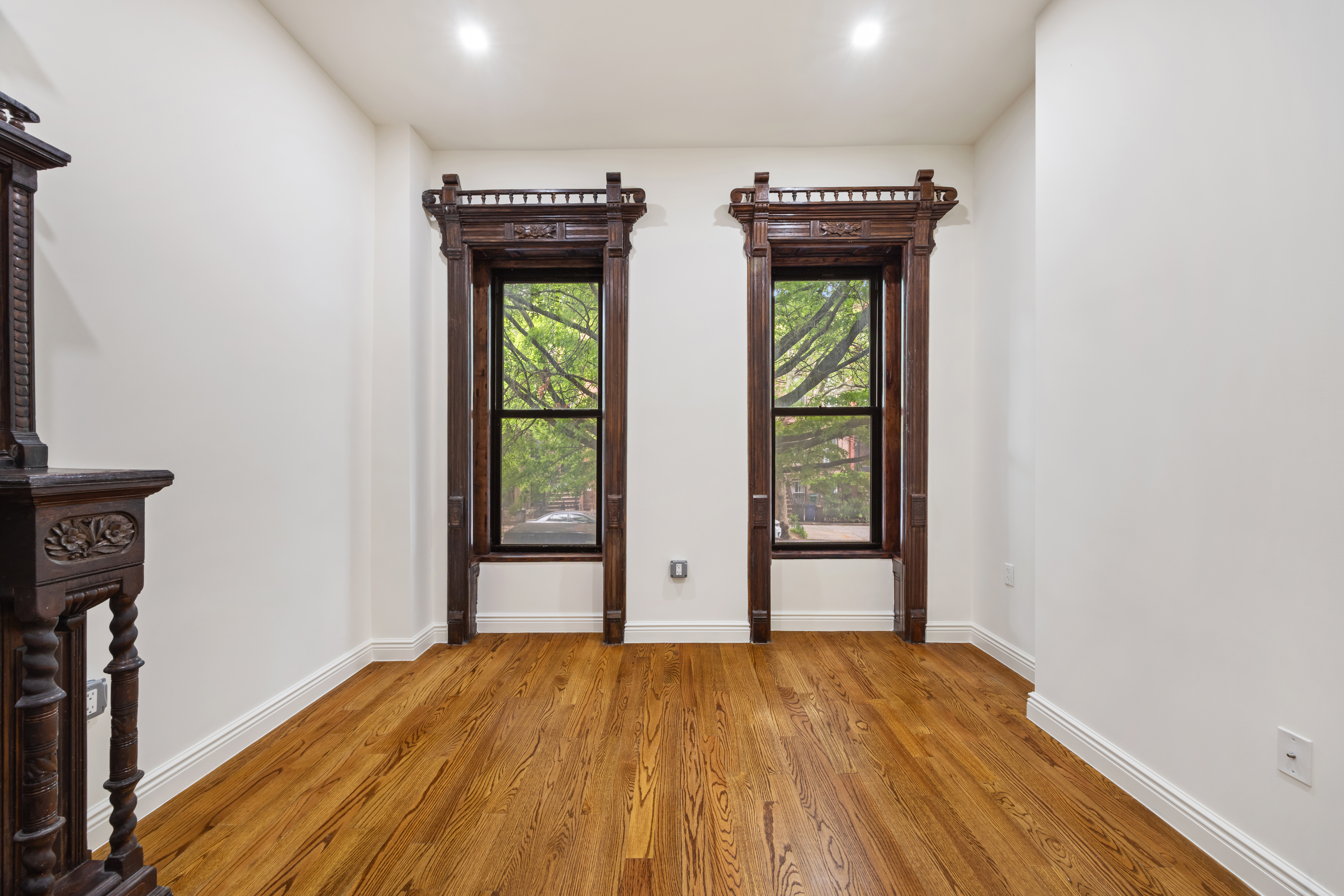 437 Putnam Avenue, Unit 2 Brooklyn, NY 11221 - Photo 3 of 9 wooden floor and window in a room