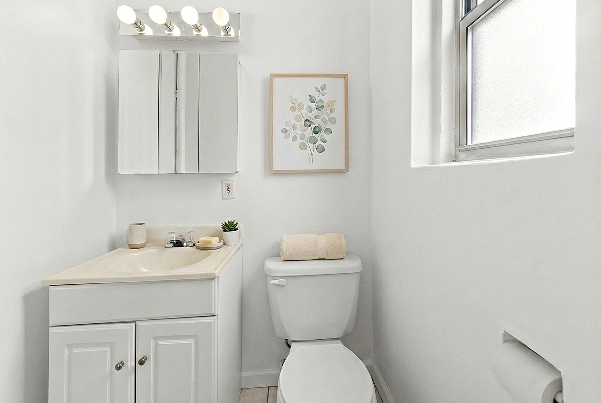 3210 Arlington Avenue, Unit 3D Bronx, NY 10463 - Photo 7 of 24 a bathroom with a toilet a sink and a window