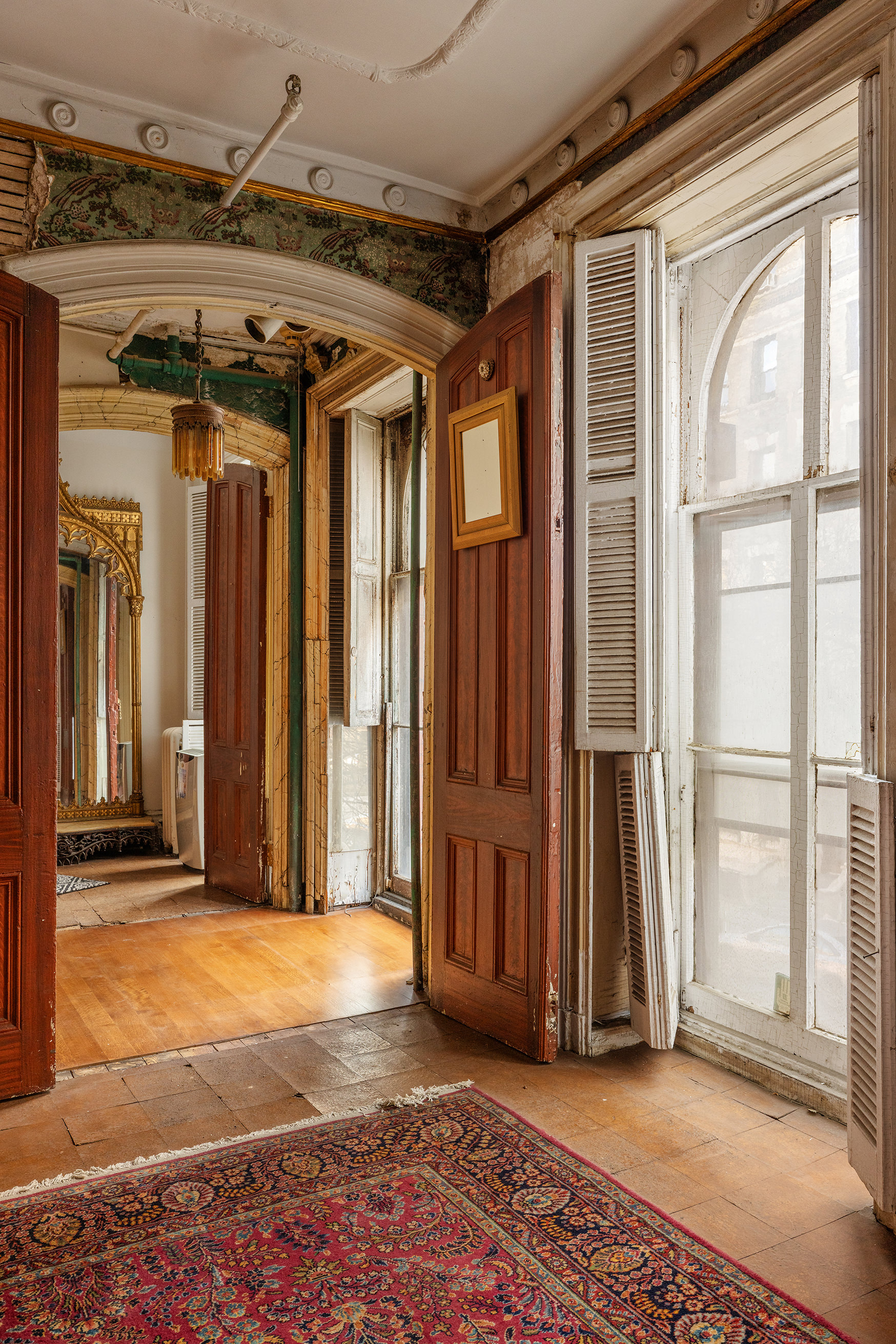 35 Stuyvesant Street Manhattan, NY 10003 - Photo 3 of 11 a view of a room with wooden walls