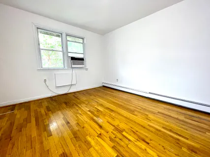 a bathroom with a sink toilet and a mirror