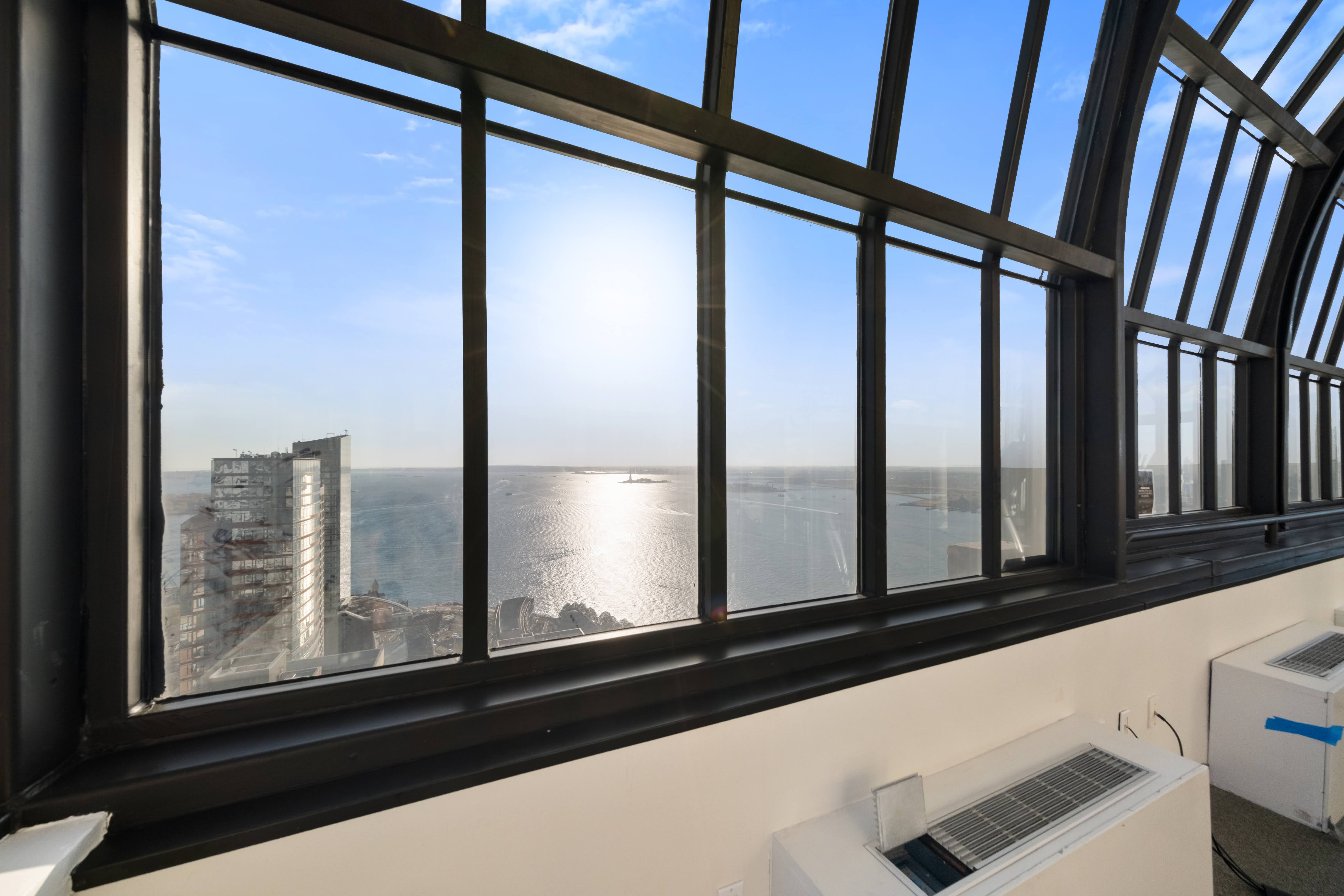 200 Rector Place, Unit 16F Manhattan, NY 10280 - Photo 16 of 25 a view of a window