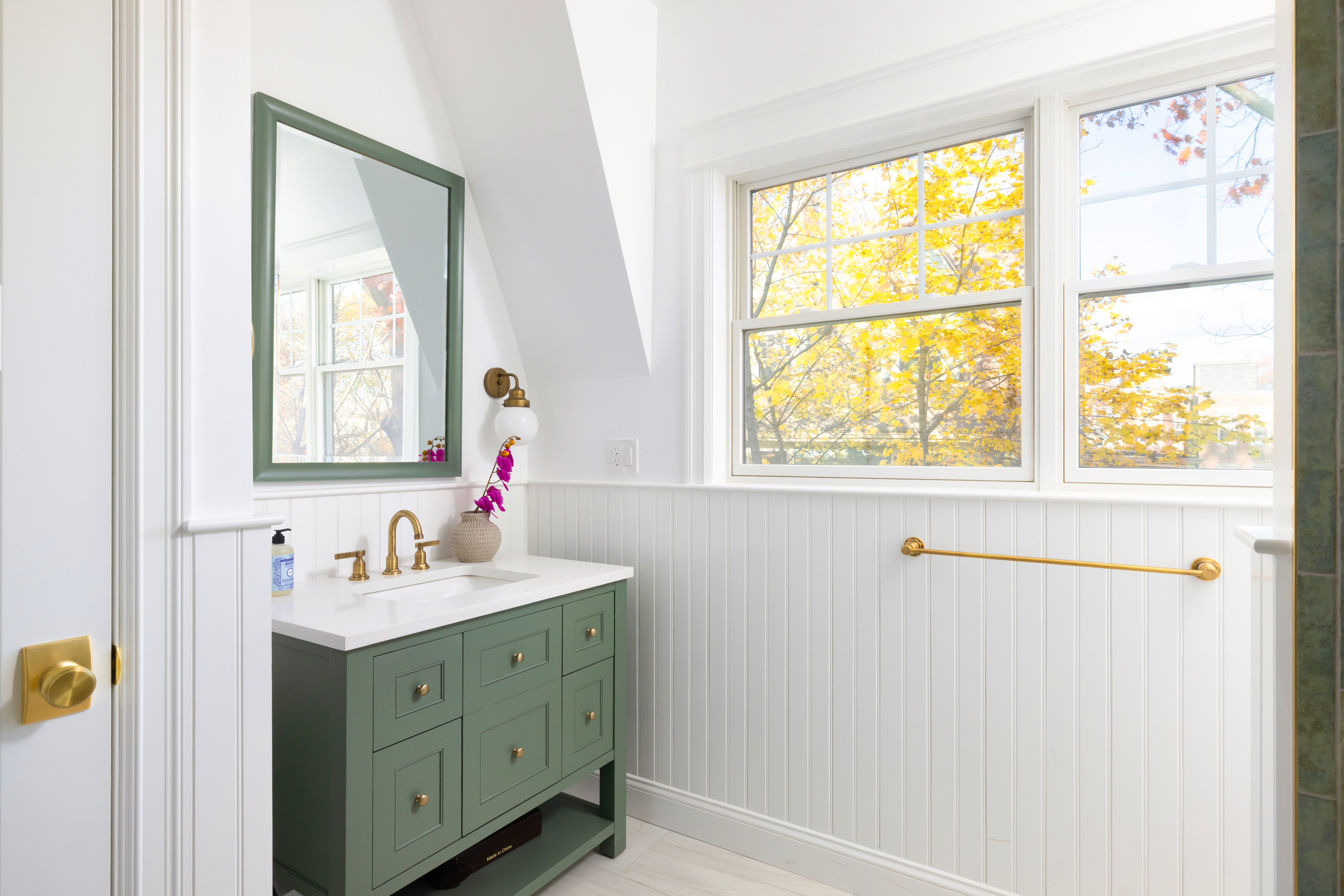 85 Naples Road, Unit 1 Brookline, MA 02446 - Photo 23 of 32 a bathroom with a sink mirror and a window