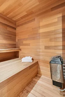 a bathroom with a bathtub and shower