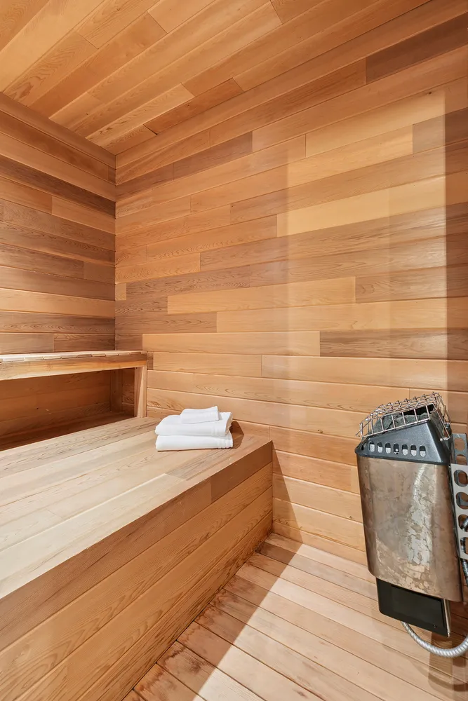 a bathroom with a bathtub and shower