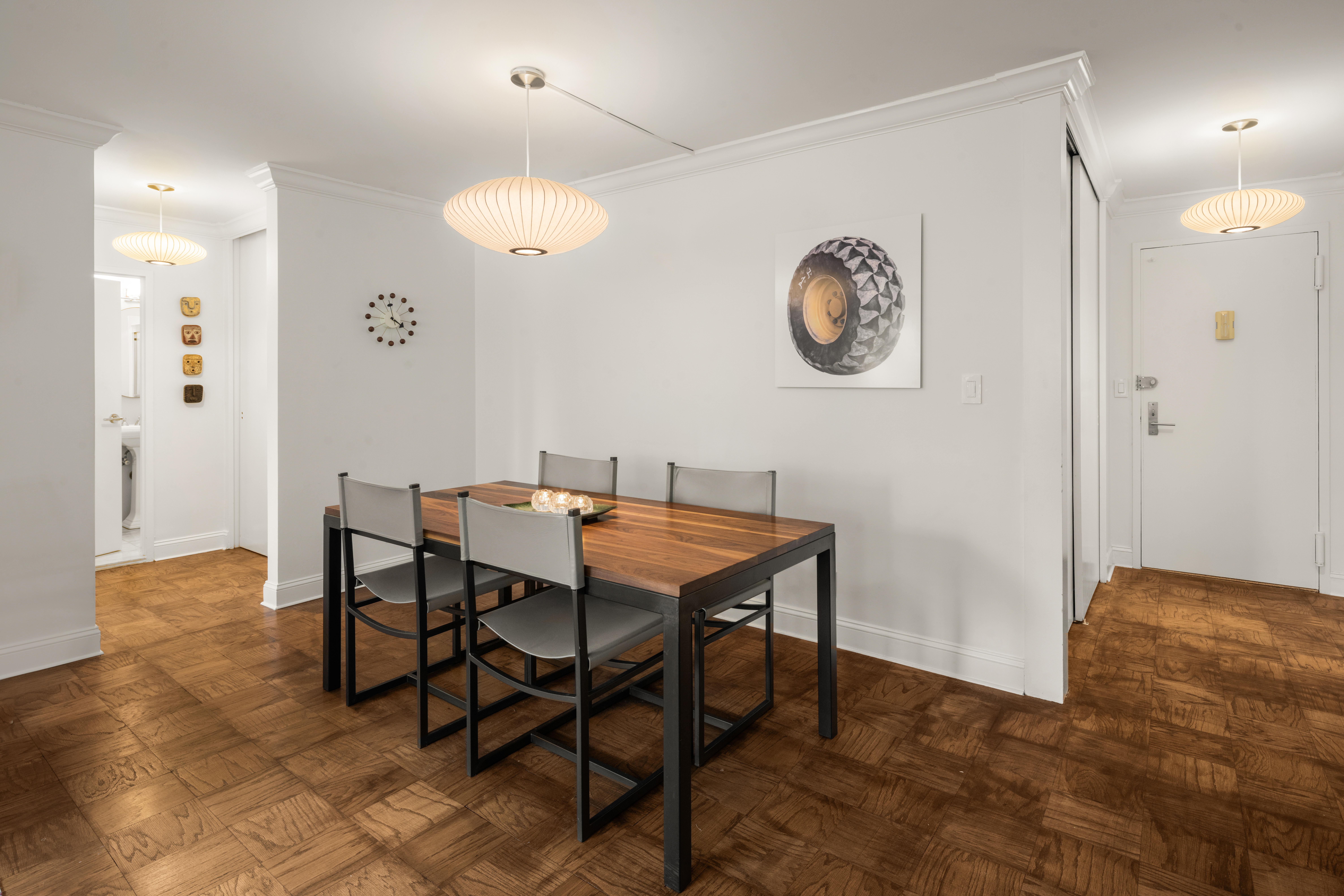 150 West End Avenue, Unit 24S Manhattan, NY 10023 - Photo 4 of 14 a dining room with a table and chairs