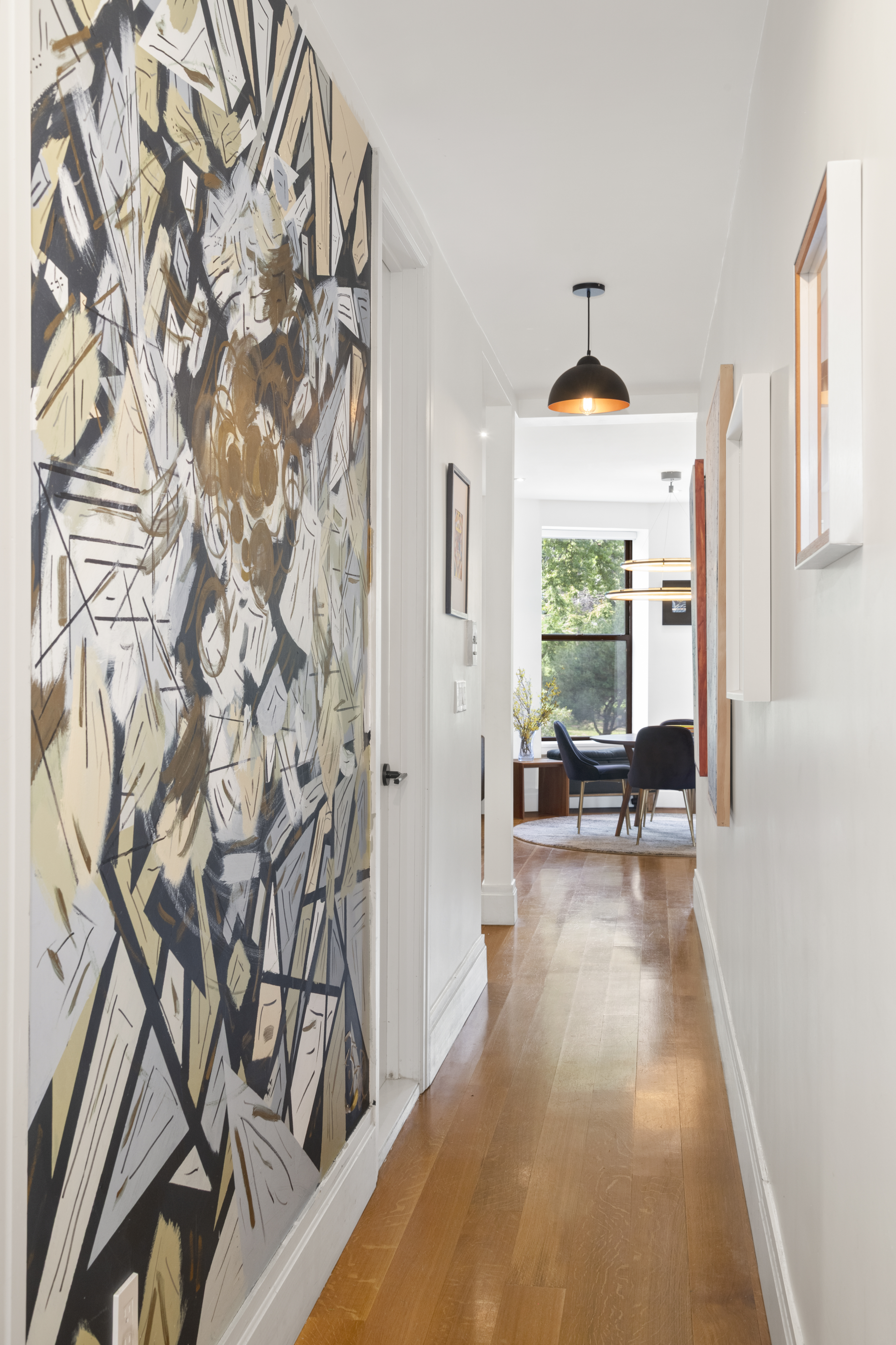 364 West 121st Street, Unit 2A Manhattan, NY 10027 - Photo 7 of 13 a view of a livingroom with wooden floor and furniture