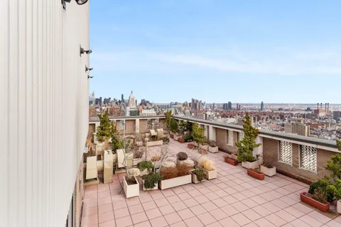 a view of a terrace with chairs