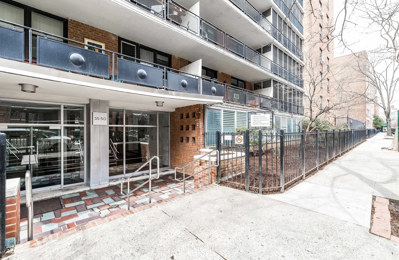 35-50 85th Street, Unit 9J Queens, NY 11372 - Photo 2 of 11 a view of a building with a large window