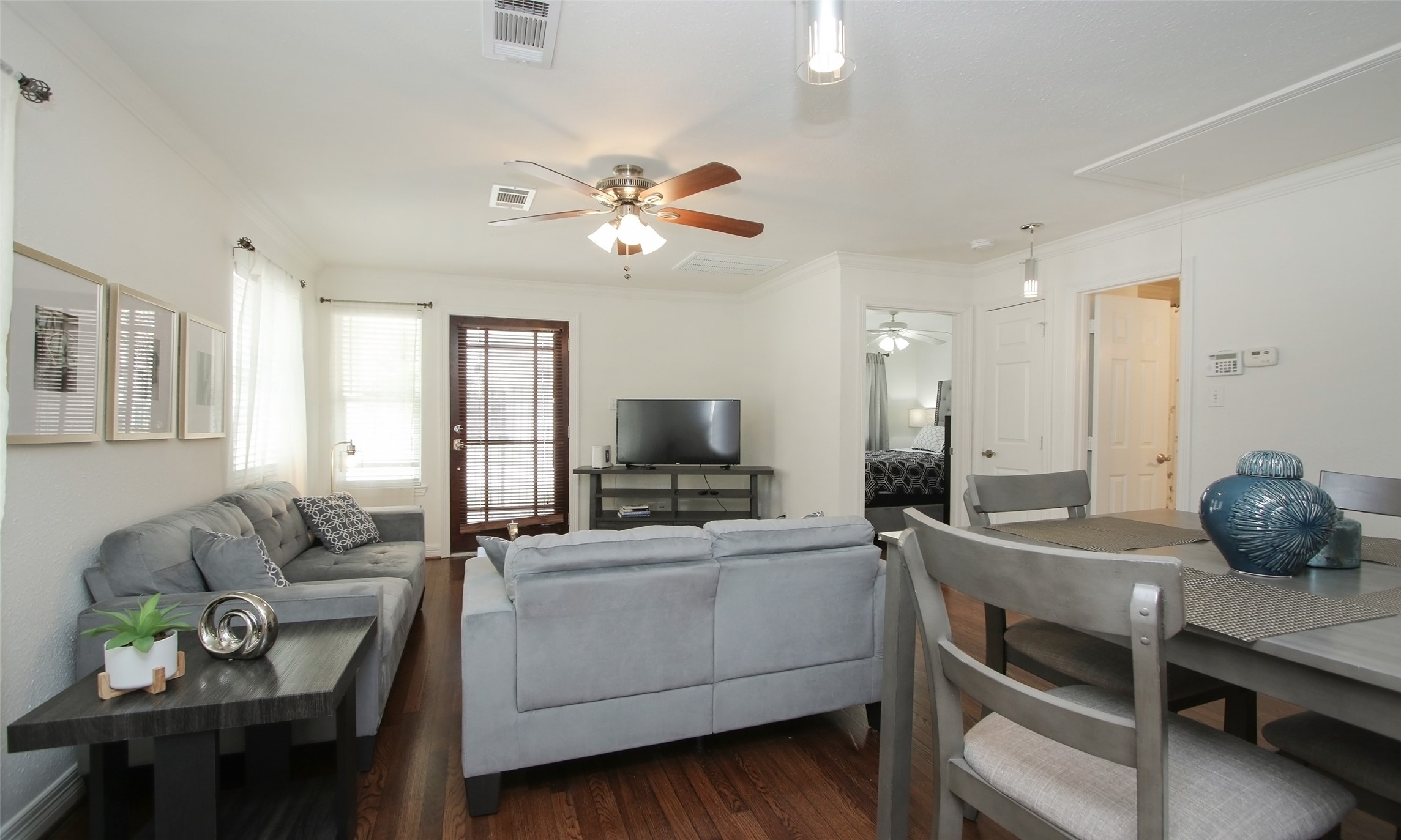 4331 Marina Street, Unit B Houston, TX 77007 - Photo 7 of 37 a living room with furniture and a flat screen tv