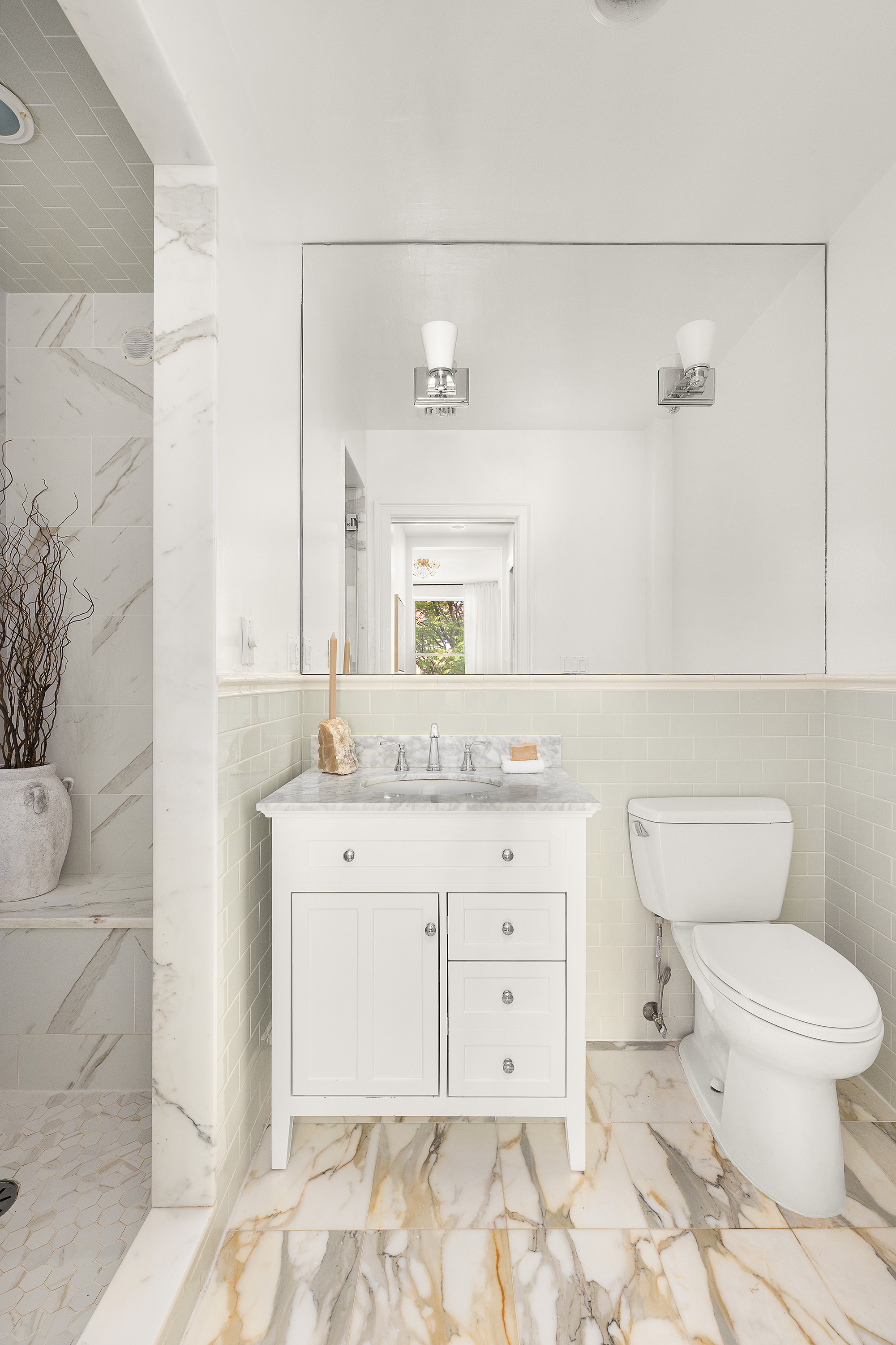 695 Degraw Street, Unit 2 Brooklyn, NY 11217 - Photo 7 of 11 a bathroom with a sink a toilet and mirror