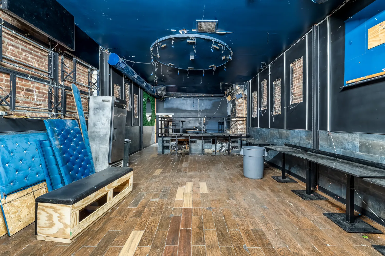 a view of swimming pool with seating area