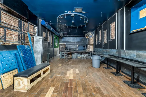 a view of swimming pool with seating area