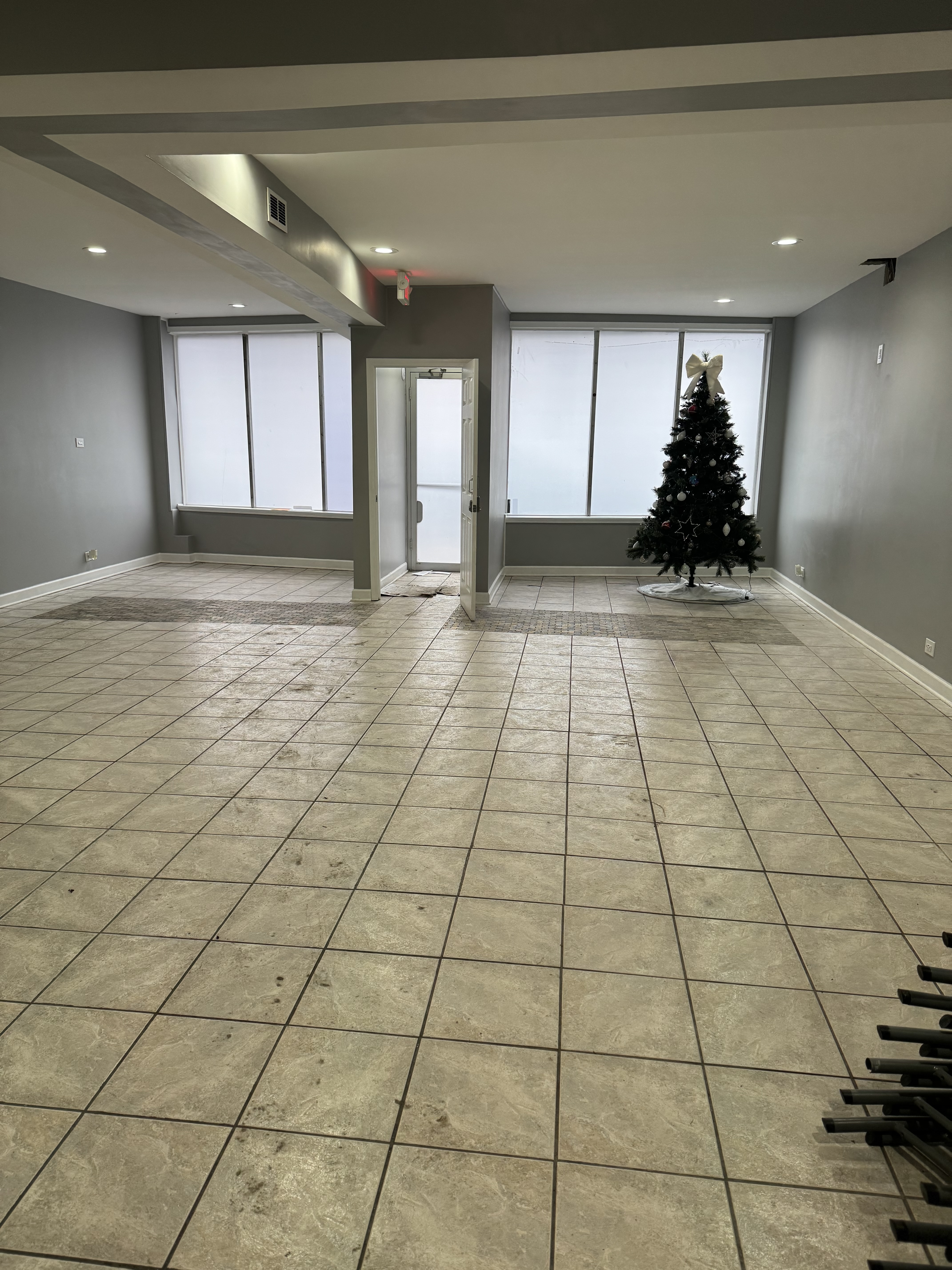 2541 West 79th Street Chicago, IL 60652 - Photo 2 of 5 a room with a black white checkered floor