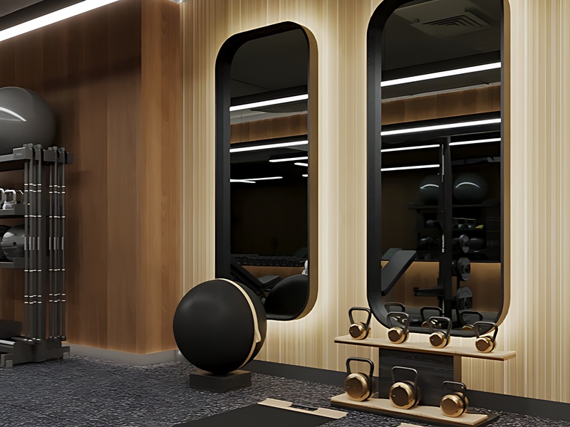 980 6th Avenue, Unit 301 Manhattan, NY 10018 - Photo 11 of 12 a room with wooden floor and gym equipment