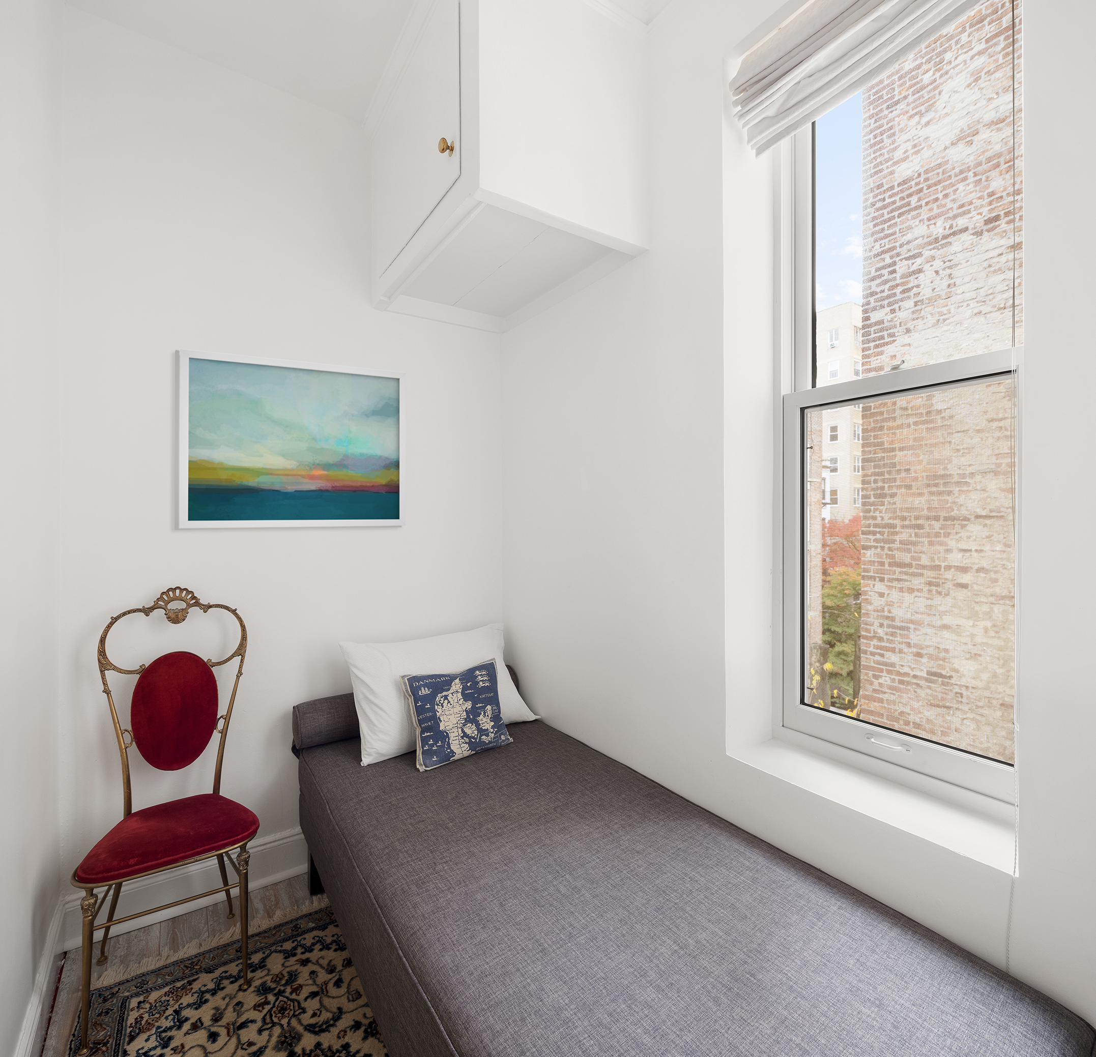 525 East 84th Street, Unit 3B Manhattan, NY 10028 - Photo 7 of 10 a bedroom with a bed and window