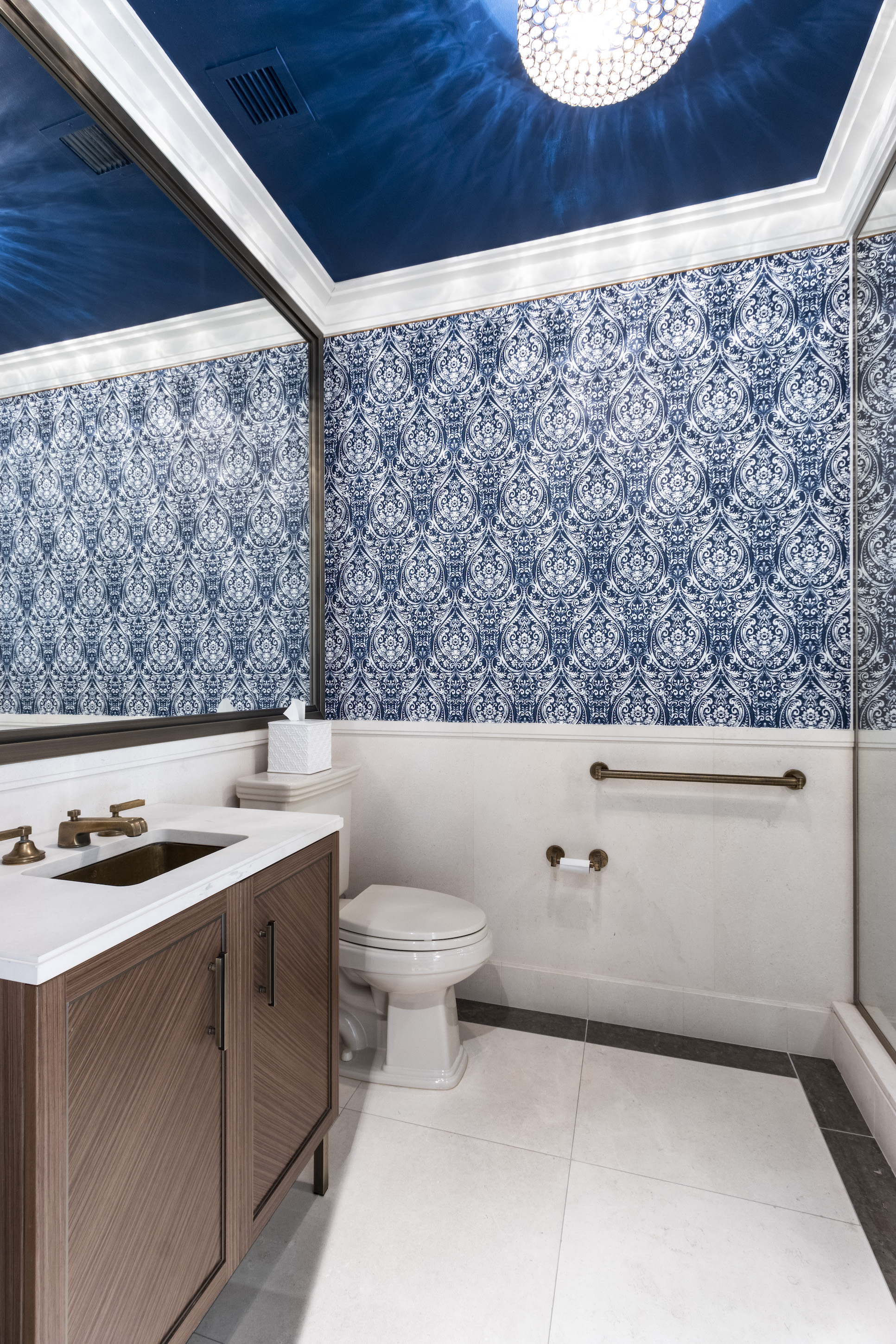 100 Barclay Street, Unit 15P Manhattan, NY 10007 - Photo 21 of 34 a bathroom with a toilet sink and mirror
