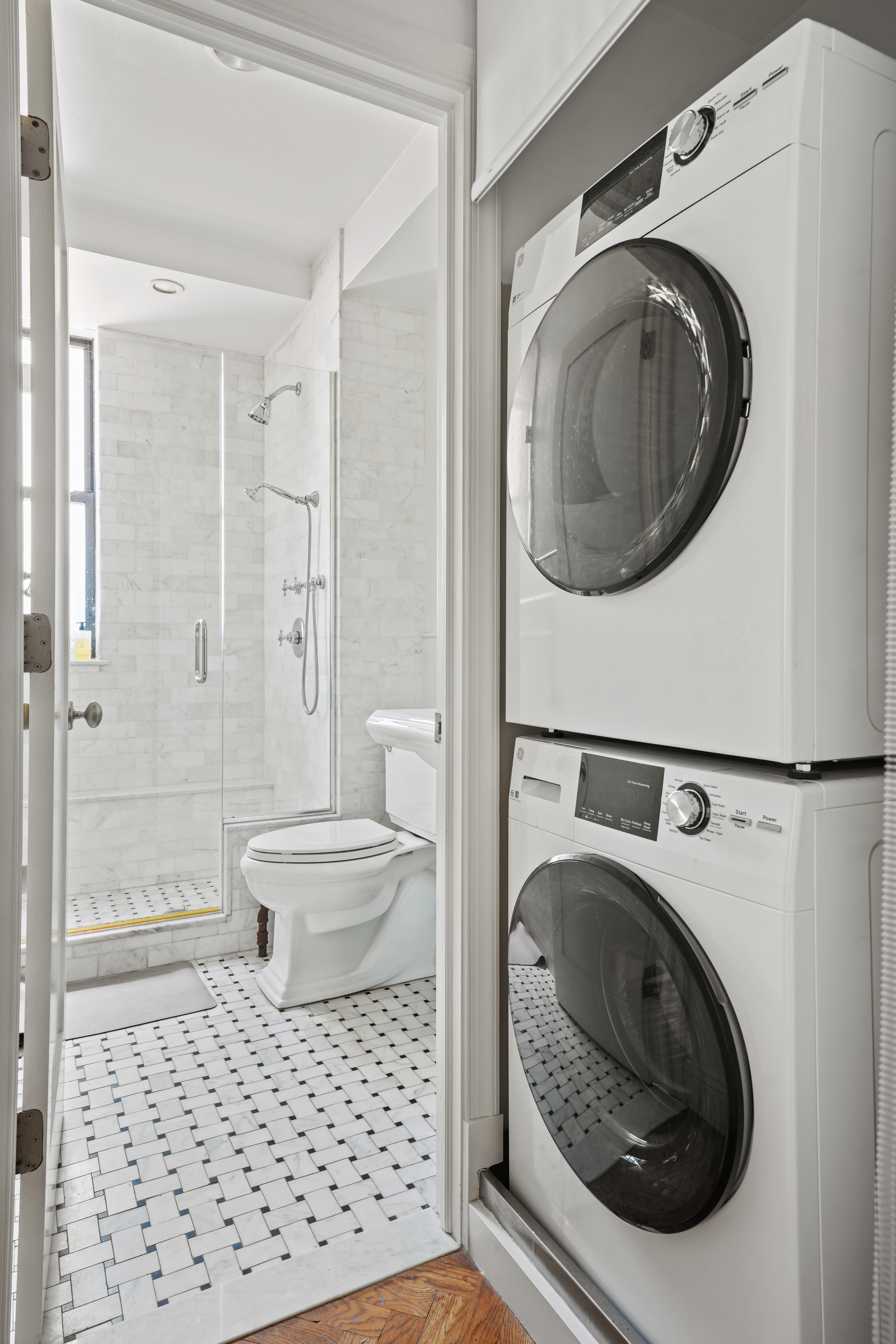 177 East 77th Street, Unit PHC Manhattan, NY 10075 - Photo 20 of 26 a bathroom with a toilet and a shower