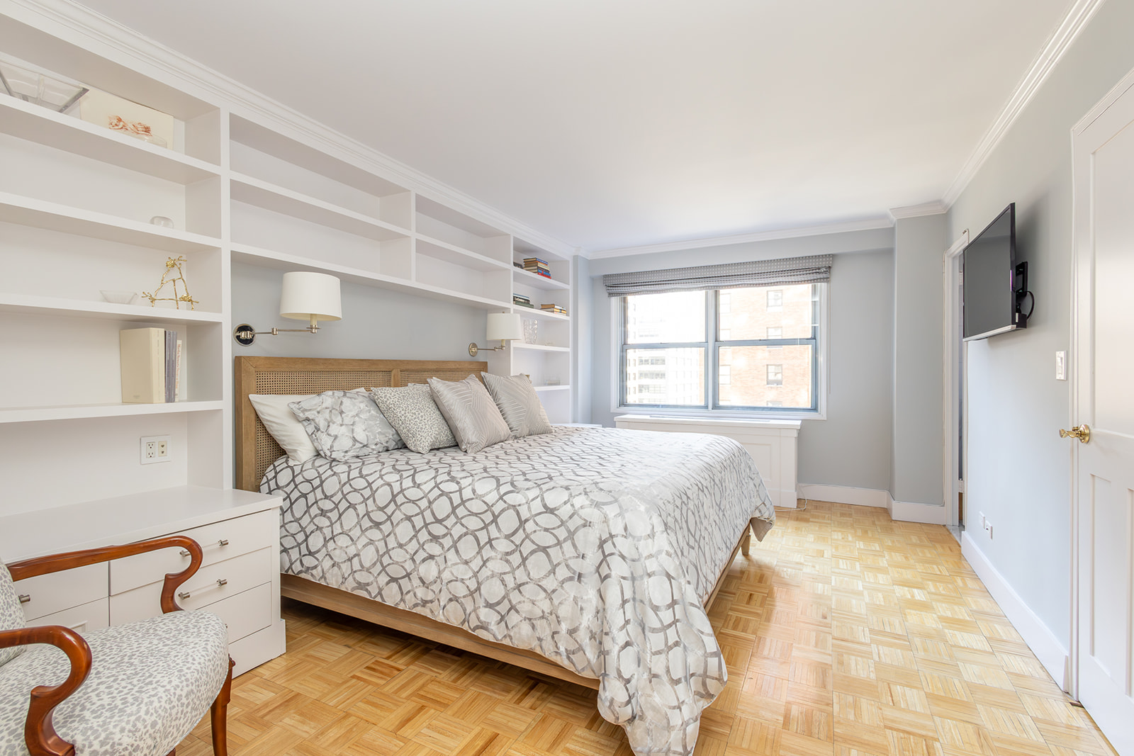 132 East 35th Street, Unit 7H Manhattan, NY 10016 - Photo 12 of 25 a bedroom with a bed and a window