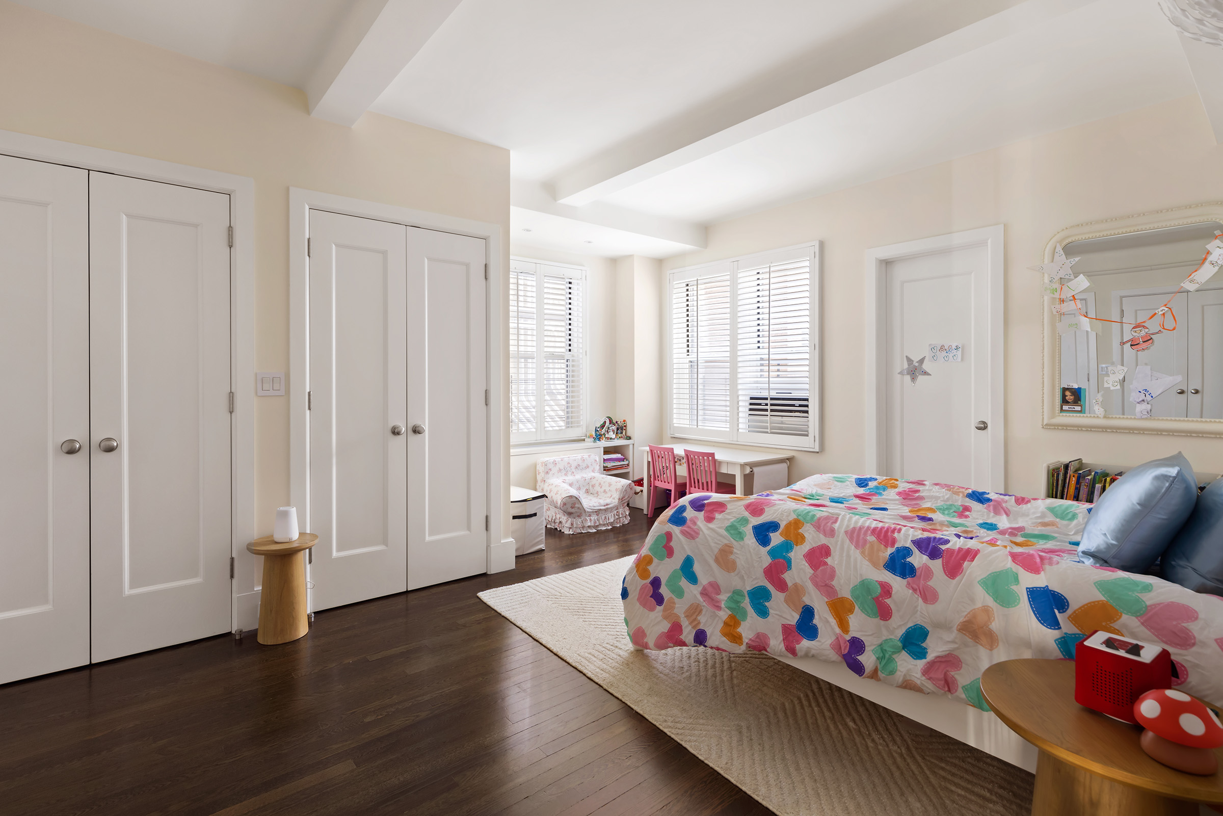 25 East 86th Street, Unit 3C Manhattan, NY 10028 - Photo 8 of 15 a bedroom with a bed and wooden floor