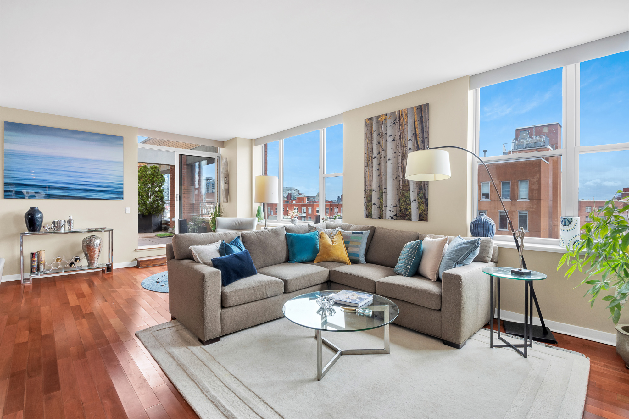 301 West 118th Street, Unit 10G Manhattan, NY 10026 - Photo 1 of 17 a living room with furniture and a large window