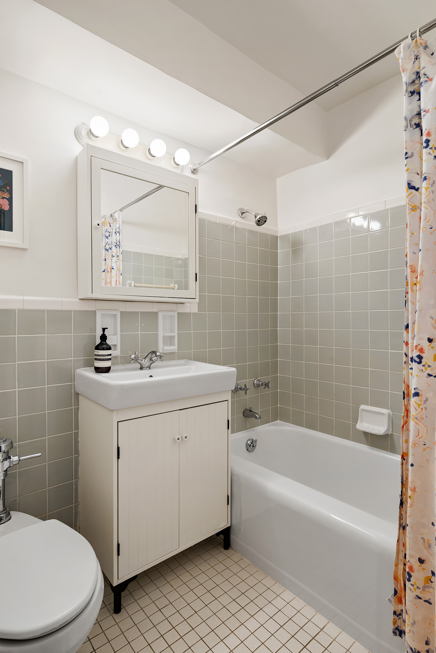 175 Willoughby Street, Unit 11L Brooklyn, NY 11201 - Photo 7 of 16 a bathroom with a sink a toilet and shower
