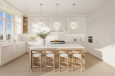 a kitchen with a table and chairs in it